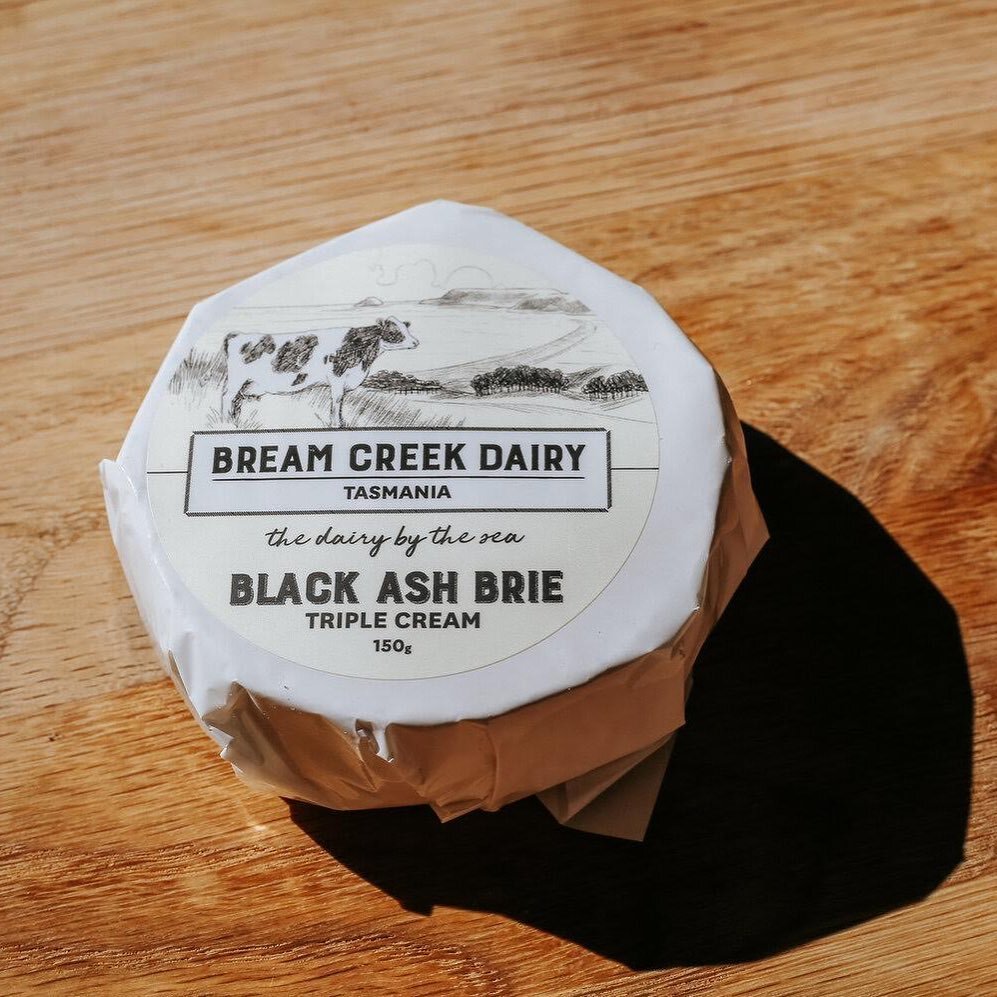 *July/August Feature Cheese* 🧀 

For the months of July and August we will be showcasing our Black Ash Brie as a feature. 

The introduction of black ash to our regular triple cream brie recipe provides the cheese with a particular smoothness and st