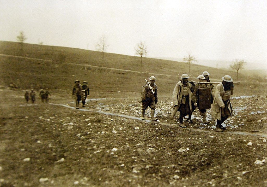 1024px-Troops_of_385th_Infantry,_90th_Division_carrying_food_to_front_WWI_(32279475483).jpg