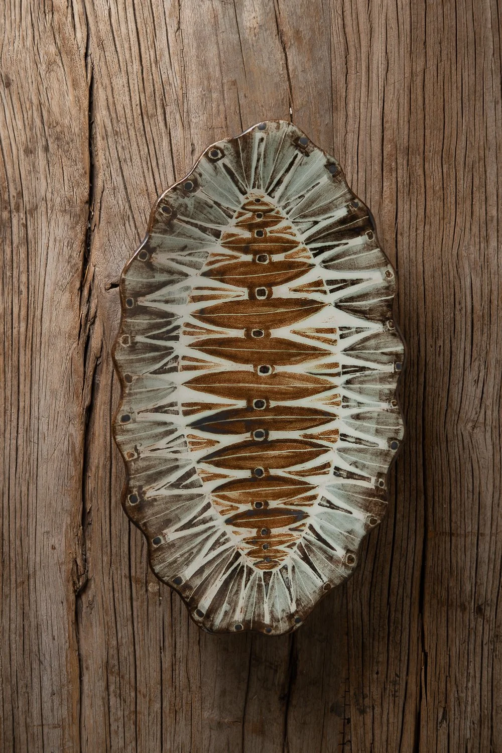 Scalloped oval Tribe dish.jpg