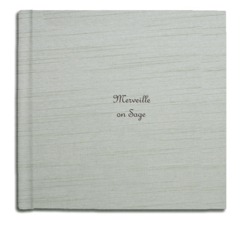 A closed book with the title "Merveille on Sage" on the cover.