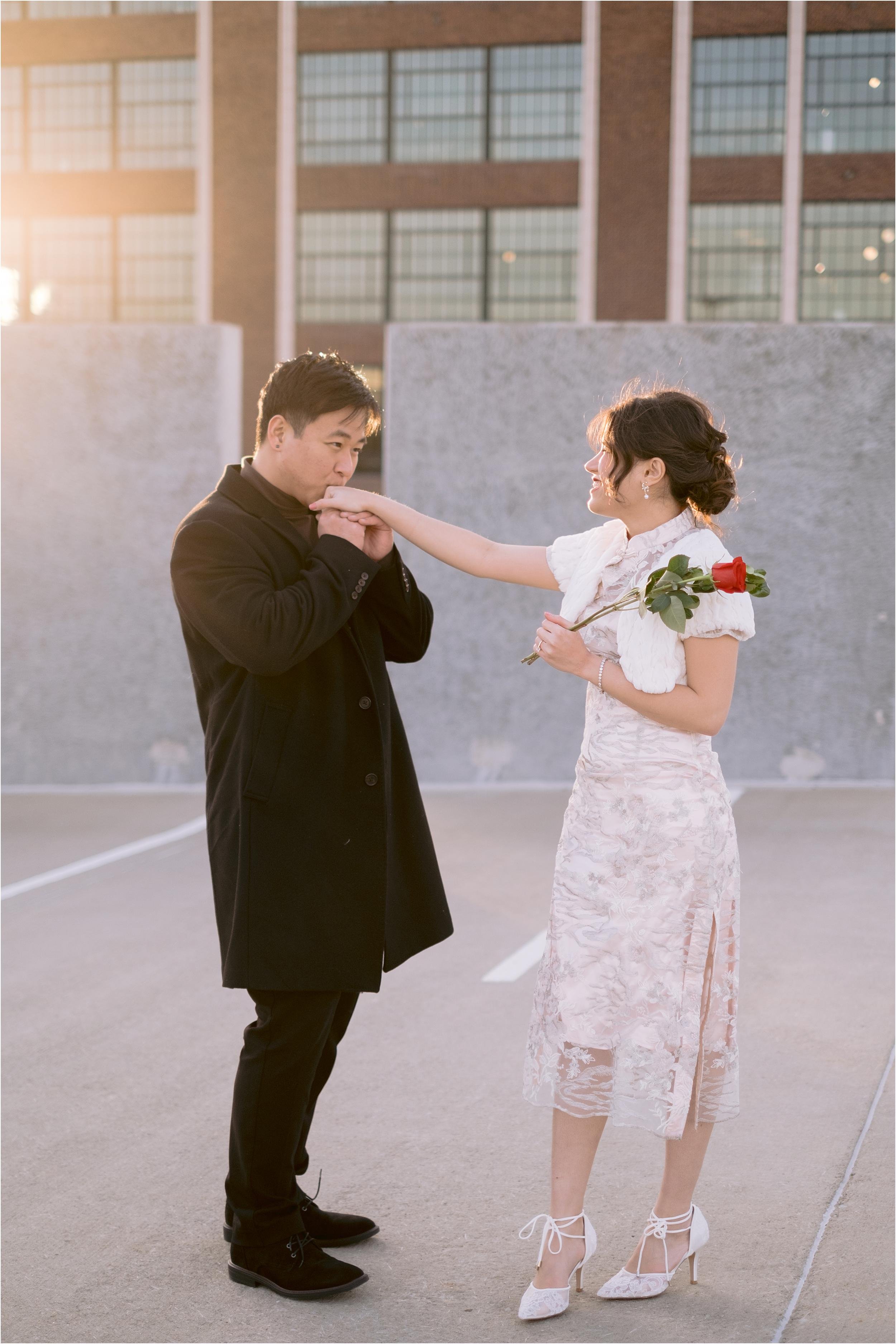 Man Kissing Woman's Hand