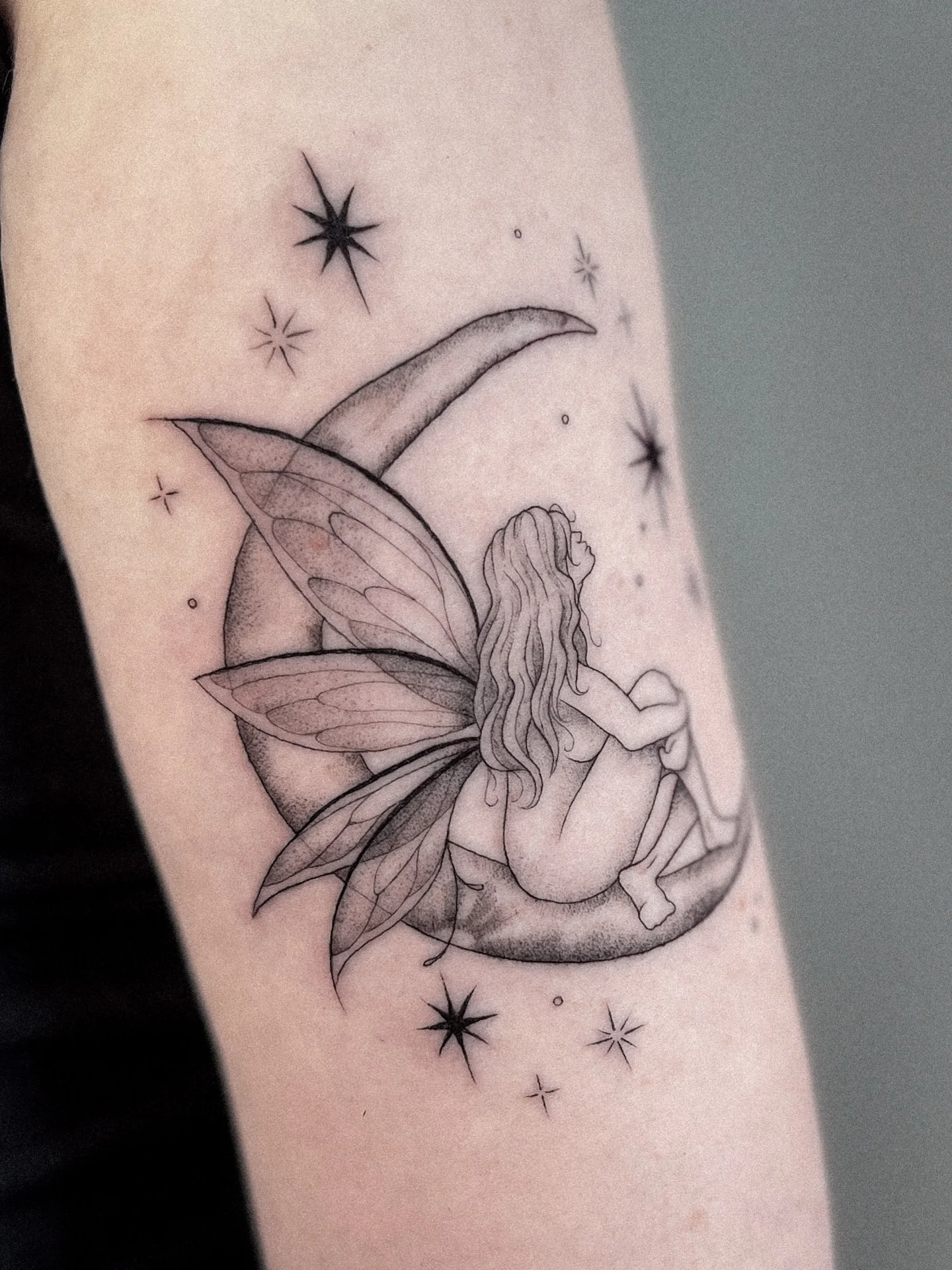 little fairy girl on a moon for megan 🌙✨ 
thank you for your trust on this one!!
.
.
.
fairy tattoo | fine line tattoo