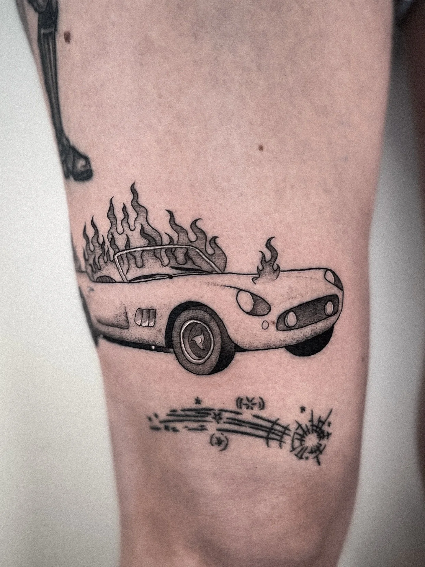 when your client says she wants a Ferrari on fire&hellip;you do a Ferrari on fire. i was waiting for SO LONG to hear the story behind this one. thank you for this fun concept Abbey! 🔥 🚗 
.
.
#seattletattooartist #travelingtattooartist #queertattooa