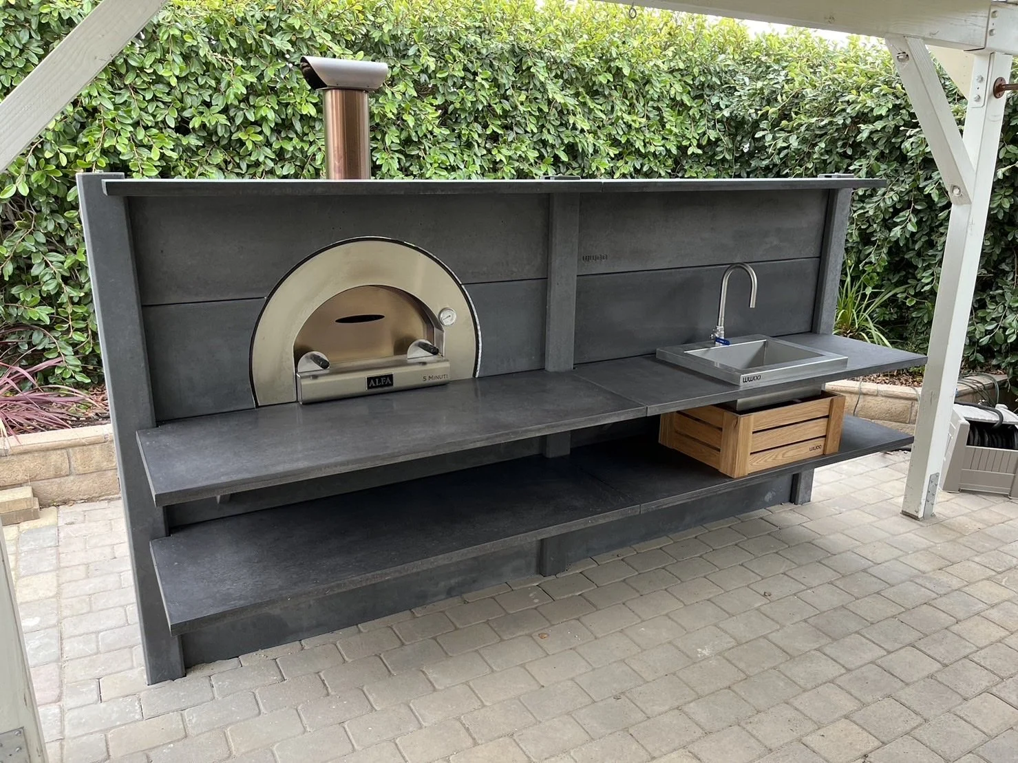 Is it possible to install my WWOO Concrete Outdoor Kitchen on top of Paving Stones?