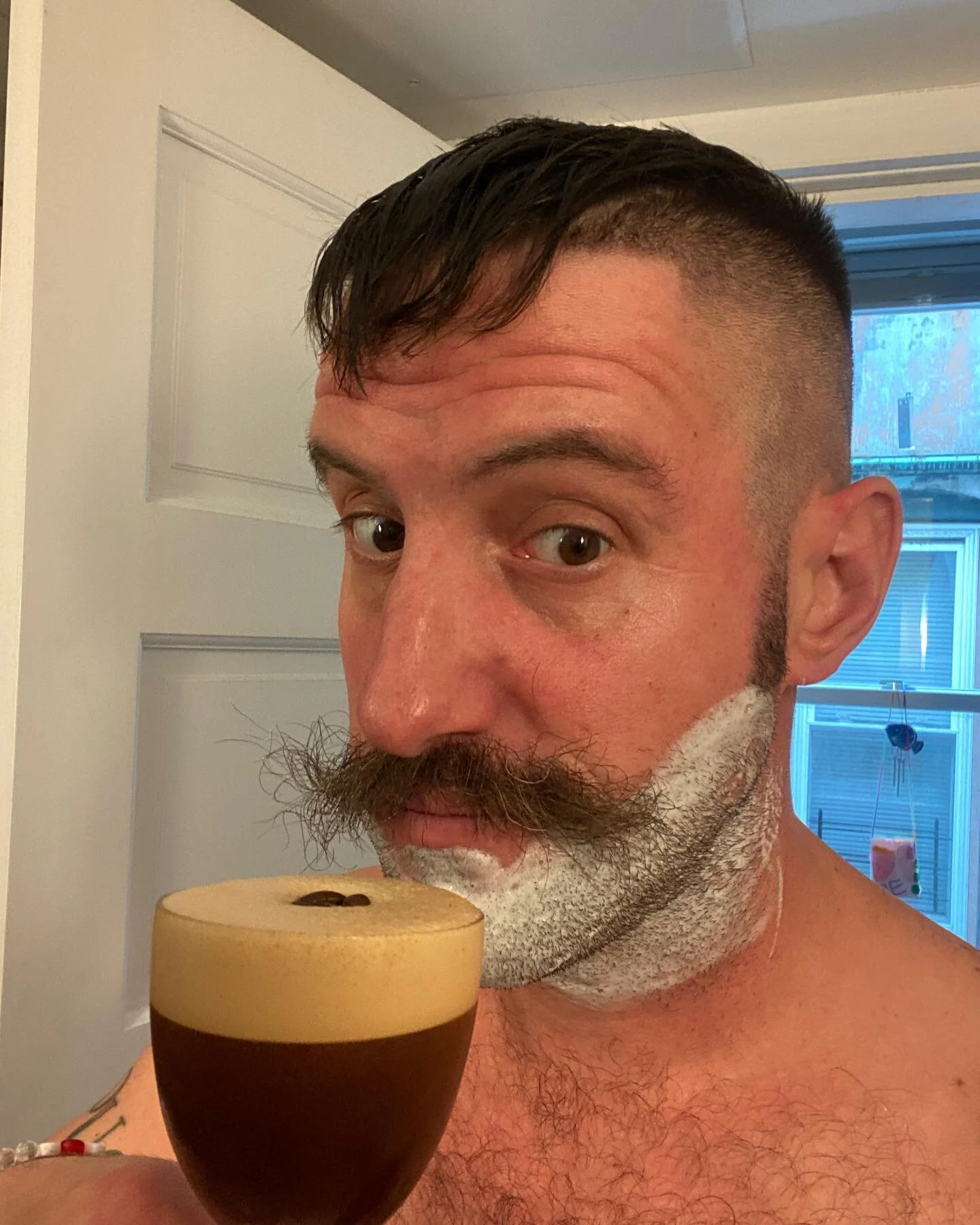 Adulting, at its best. Espresso martini while shaving. 
***
Espresso Martini
2 oz Vodka
.75 oz Montenegro
Barspoon cinnamon syrup
1 oz fresh pulled espresso
Shaken, strained, shave.