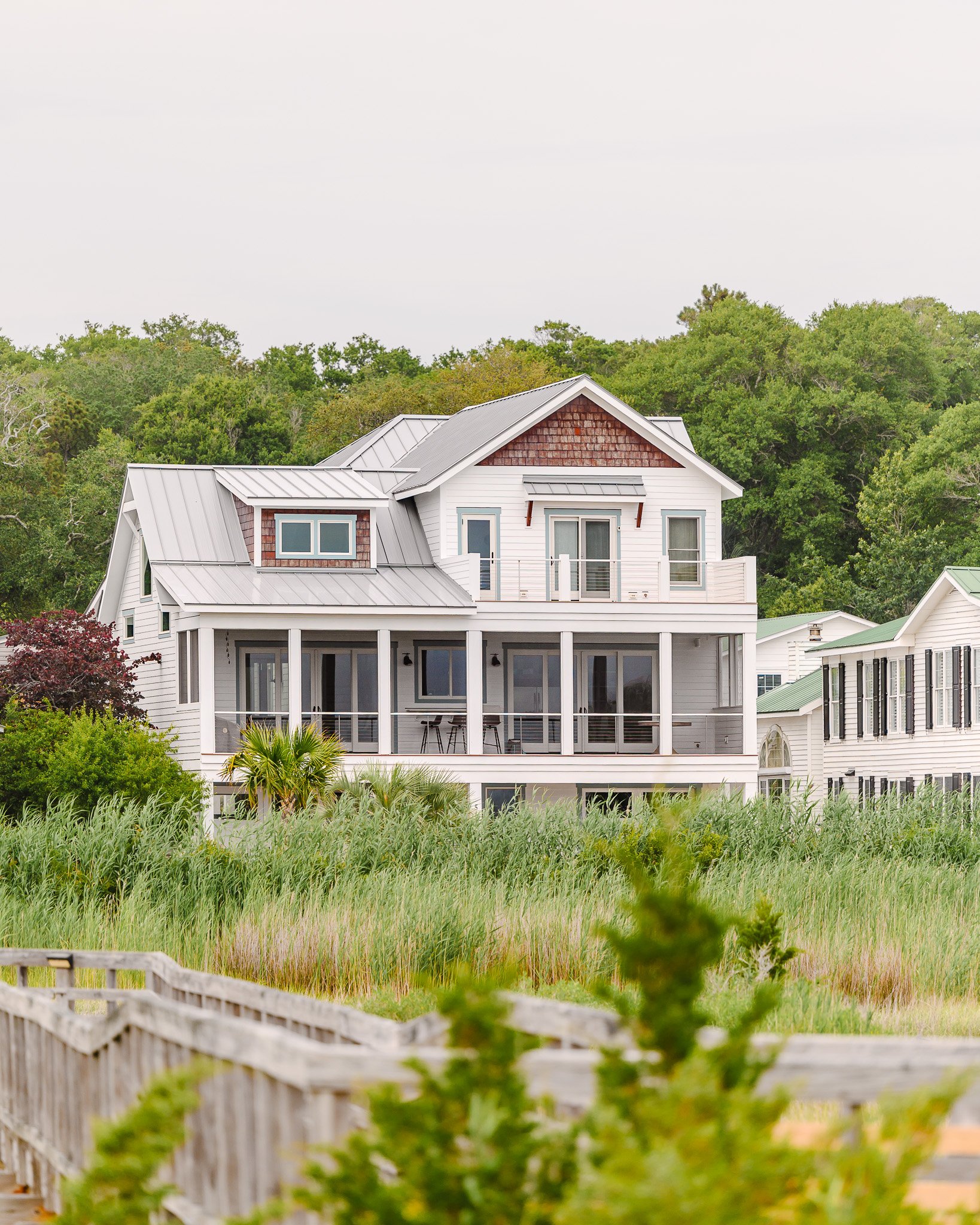 Historic waterfront home overlooking the Cape Fear River viewed from the Southport Marshwalk.