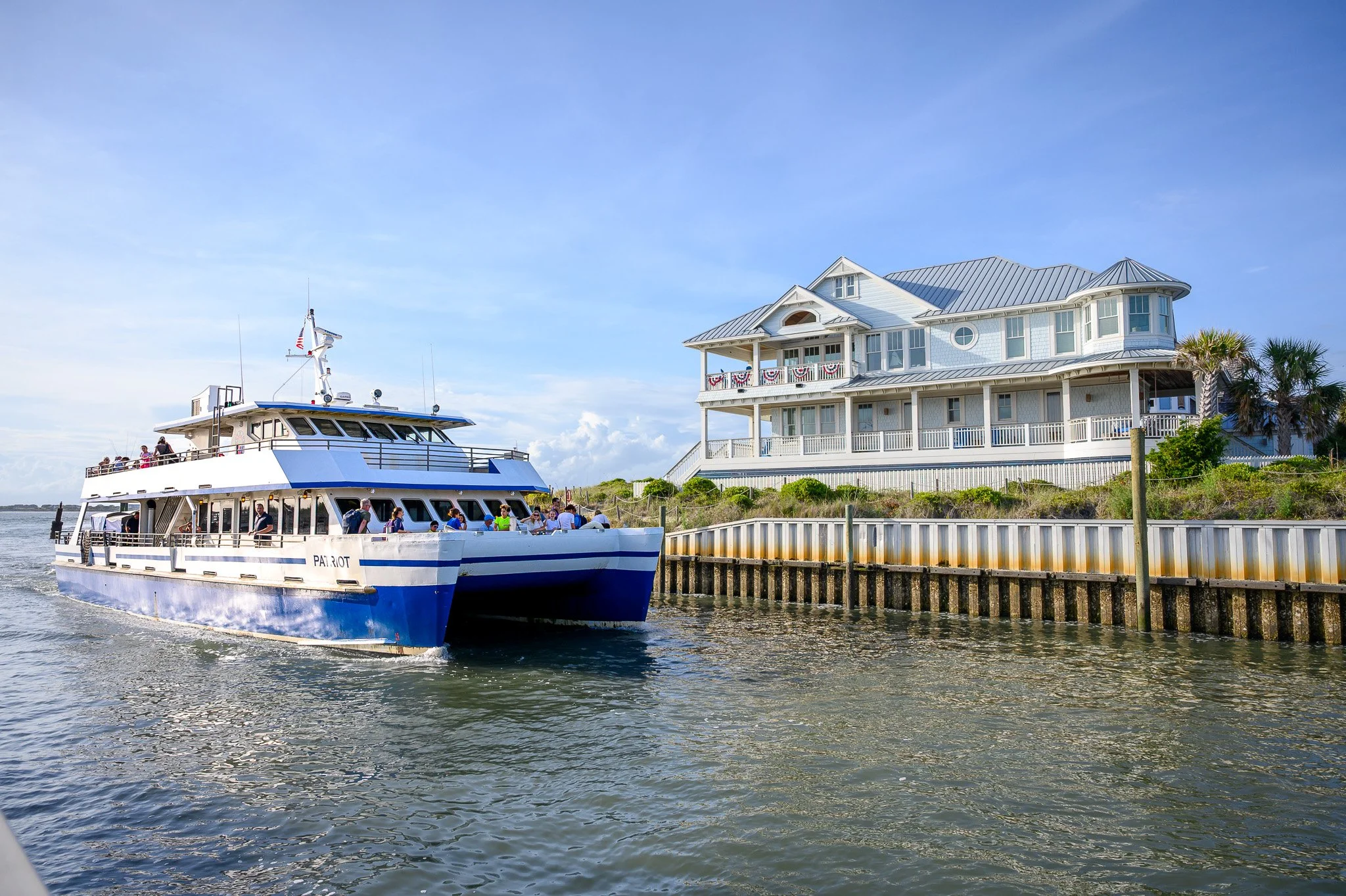 Bald Head Island ferry arriving at the marina on Bald Head Island, North Carolina.