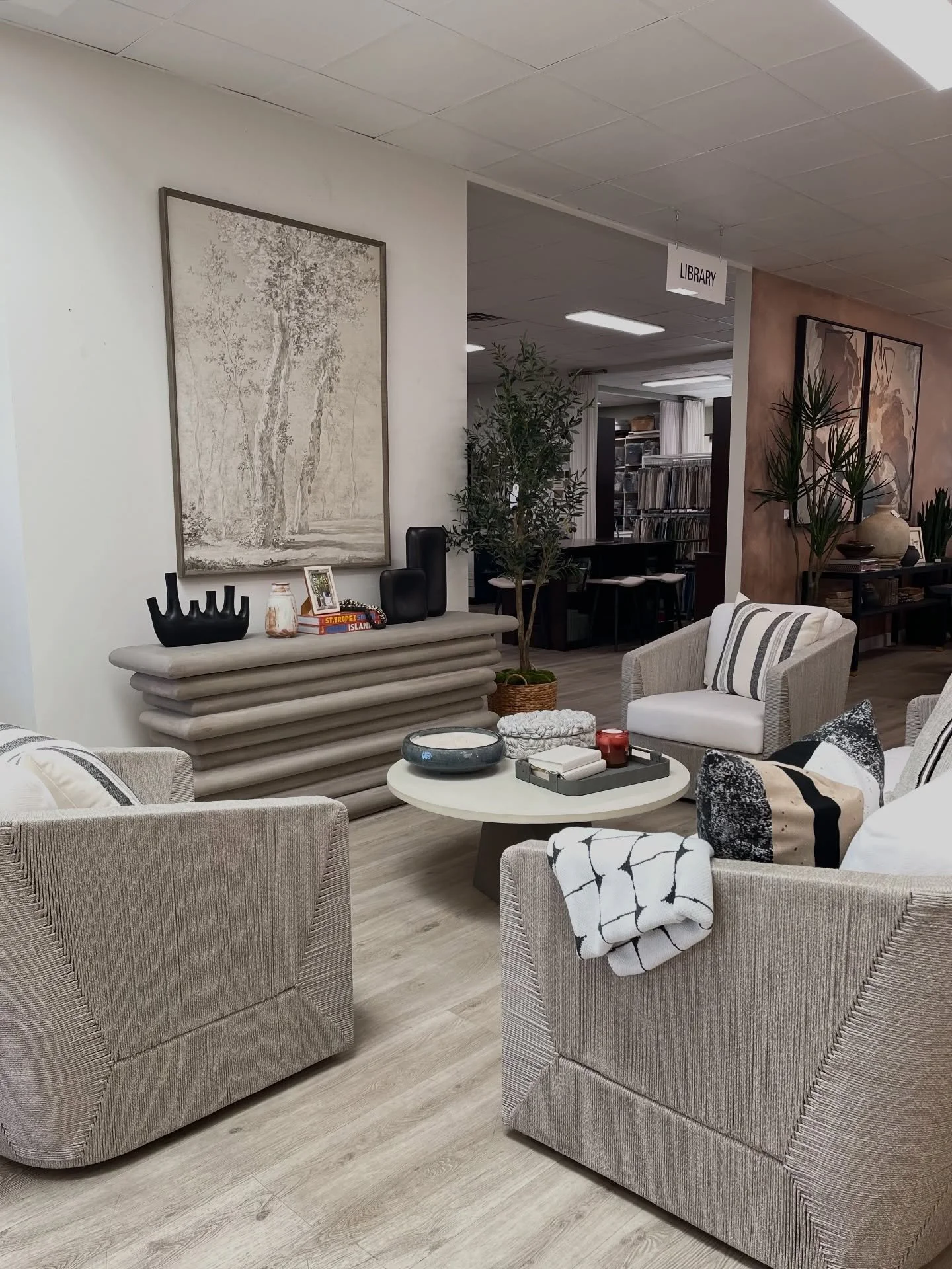 An edgy beach house living room, done right😍👏🏼 

Thinking about your next second home remodel? This is your sign to design a living room that feels light, relaxed, and effortlessly lived in. Bring your ideas in and our furniture experts will make