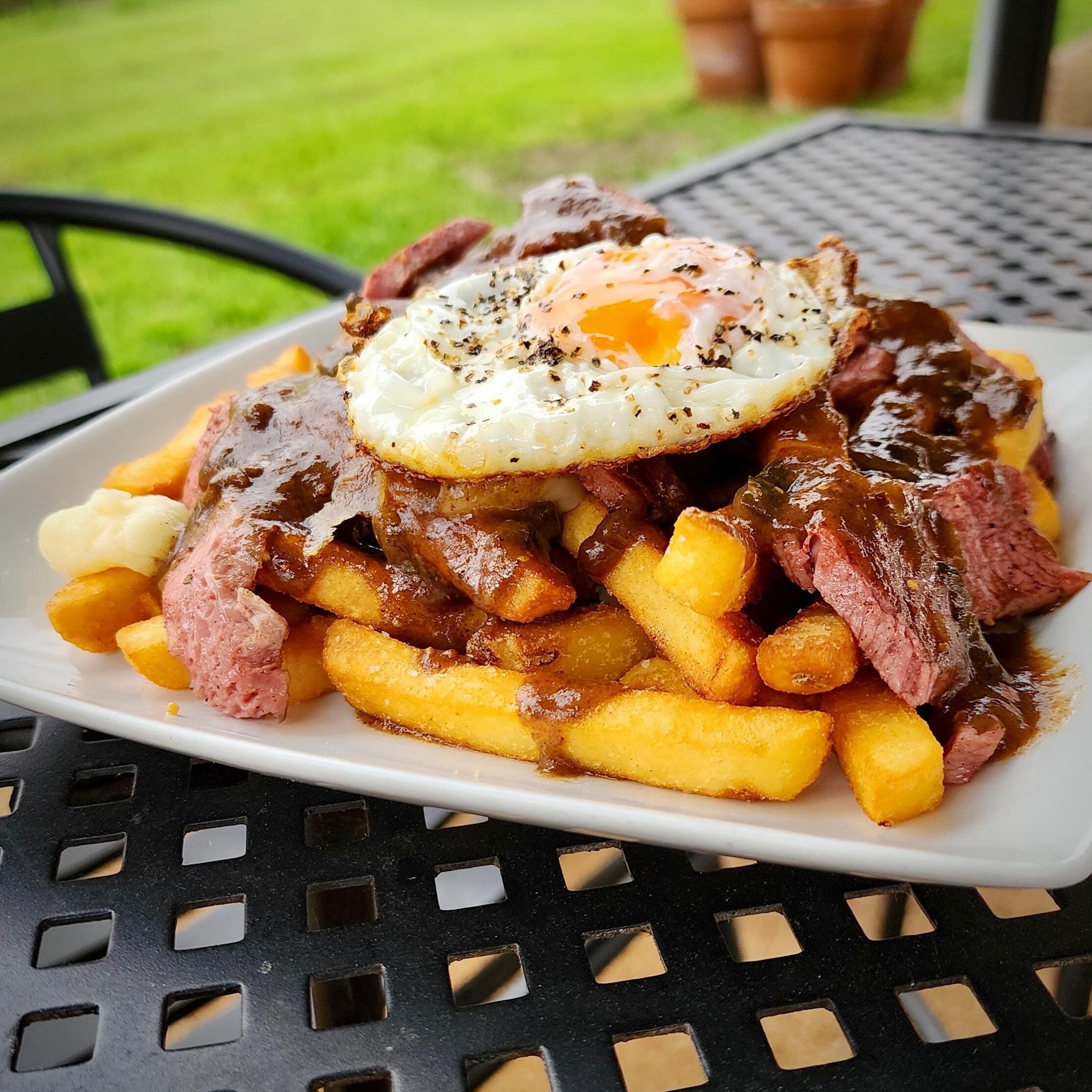 🍀Guinness Corned Beef Poutine🍀
Hot, crispy fries smothered in our homemade gravy,  fresh melty cheese curds, shredded corned beef, and topped with a perfectly fried egg! It&rsquo;s almost St. Patty&rsquo;s day and we like to celebrate the holiday w