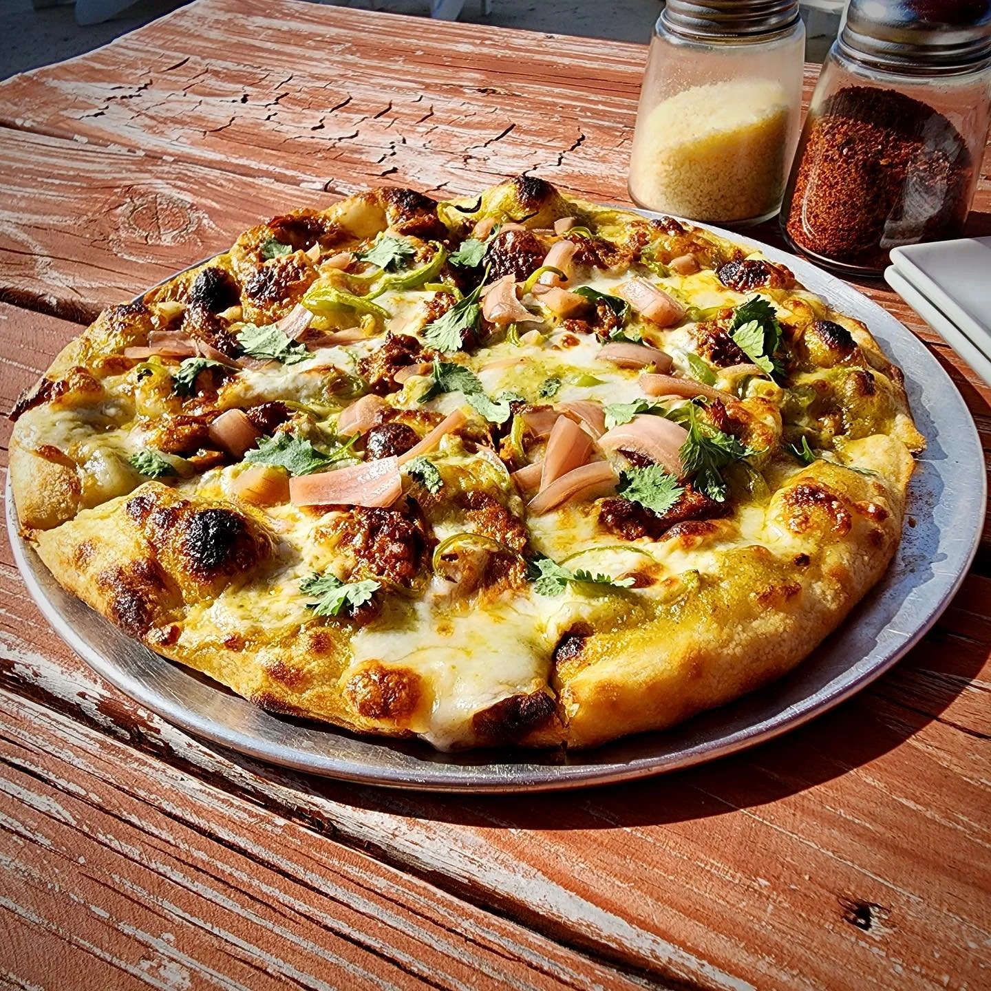 ✨Some Like It Hatch✨
The votes are in and our special this weekend is officially named the Some Like It Hatch pizza. It is topped with hatch chile sauce, mozzarella, Oaxaca, and quesadilla cheeses, Yucat&aacute;n pulled pork, fresh hatch chiles, pick