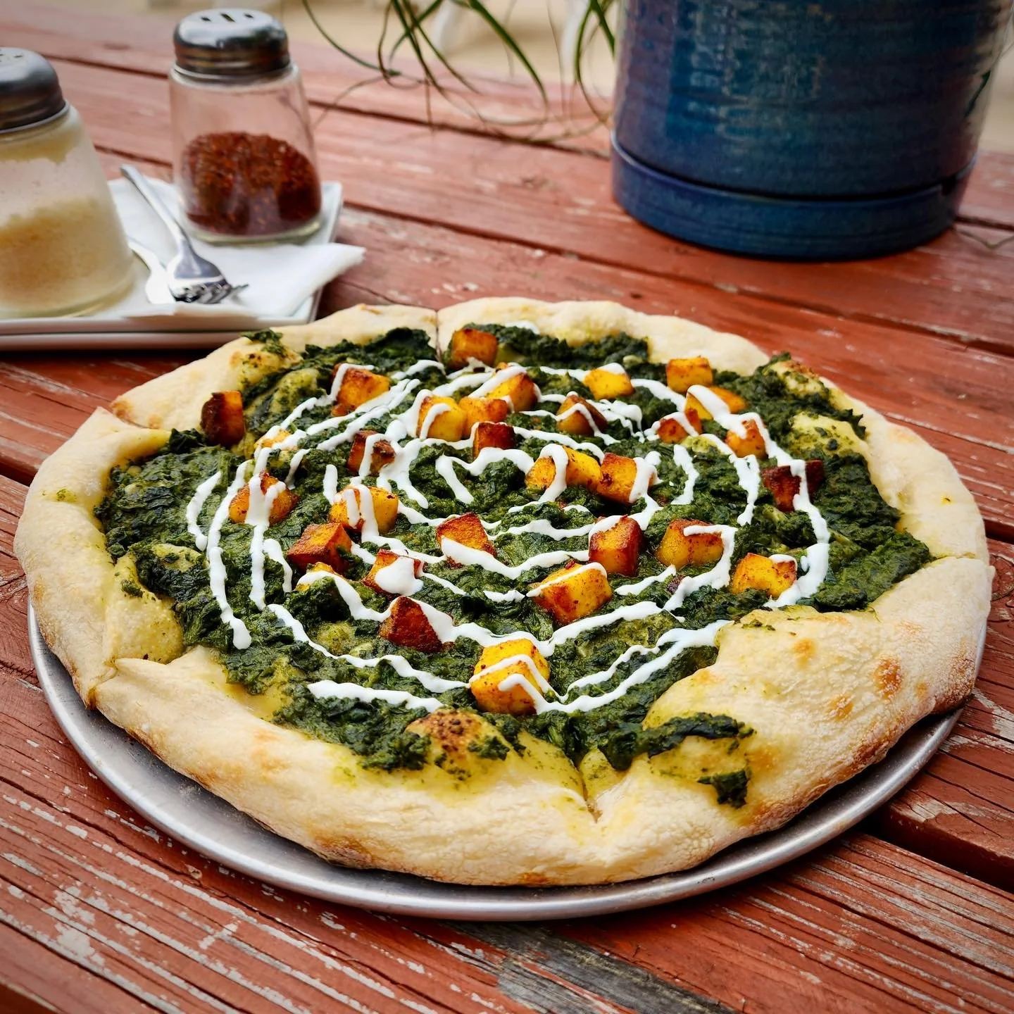 🌱Saag Paneer Pizza🌱
This week we wanted to highlight one of our favorite February specials, the Saag Paneer Pizza! Crispy marinated paneer in a creamy, savory spinach sauce all cooked on our homemade sourdough pizza crust and finished with a swirl 