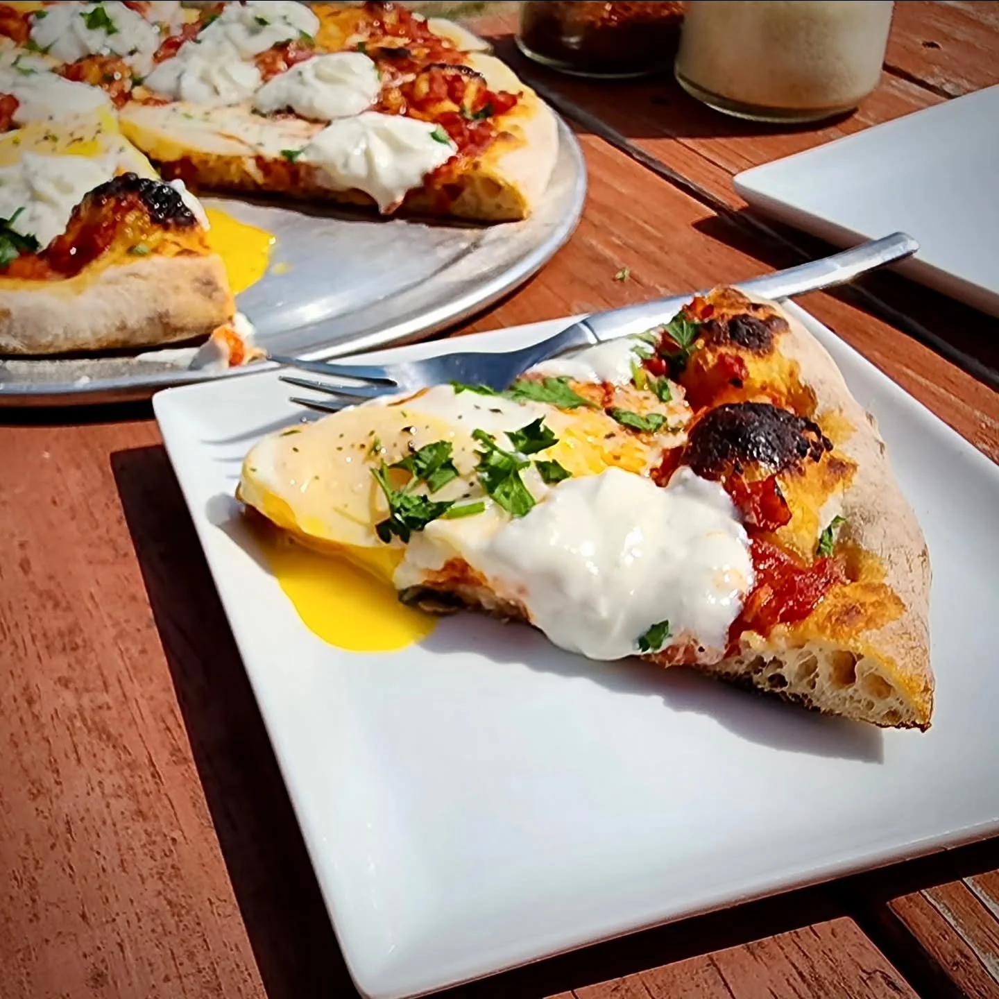 When we started making pizzas we knew from the get-go we had to get the sourdough crust just right. It had to be crispy, malty, light and hold up to the heft of brisket, steak, enchilada or Guinness sauces and whatever else Alex might think up. After