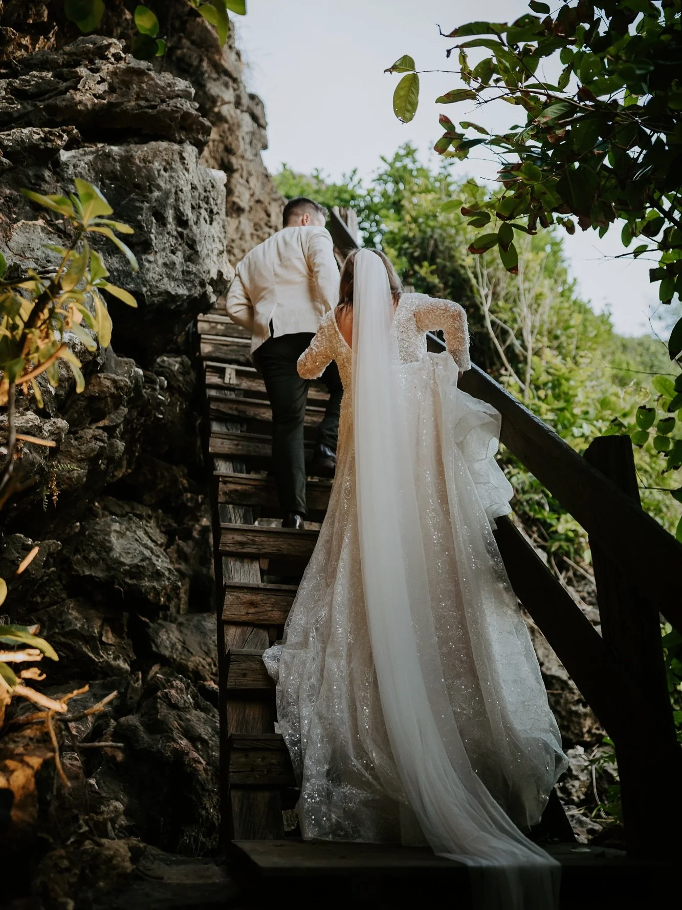 ~ Maaika &amp; Tim ~ just married. 
Part 1 of this Bali stunner. 
Maaika being an absolute trooper getting down &amp; back up the uluwatu cliffs for some beach photos in the Bali humidity &amp; this dress. 
The surf, the view, the Balinese culture &a
