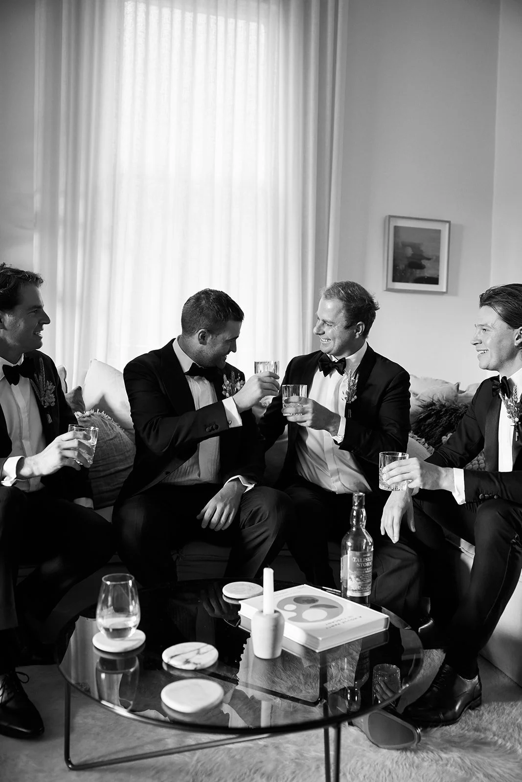 Groom getting ready with friends before his Melbourne Town Hall wedding