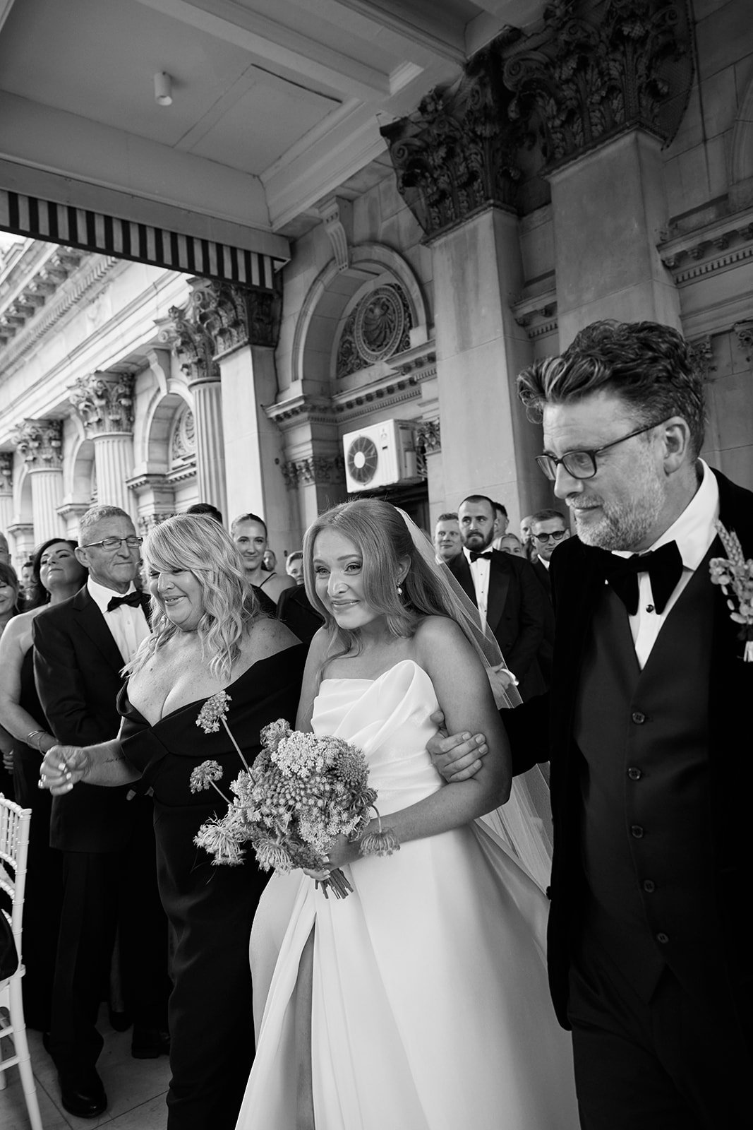 Chelsea and Henry saying “I do” on the balcony of Melbourne Town Hall.