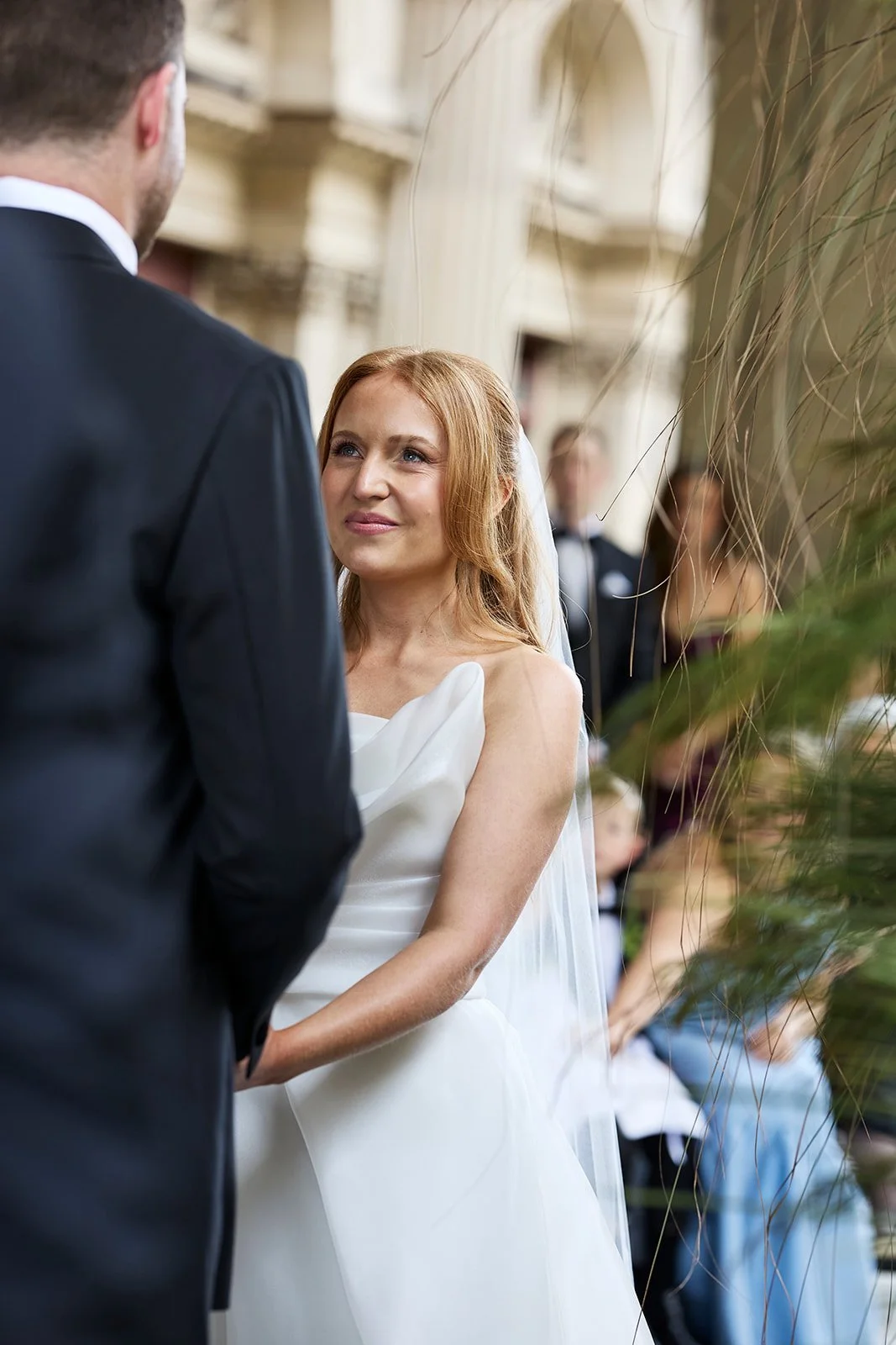 Chelsea and Henry surrounded by family and friends during their Melbourne wedding ceremony.