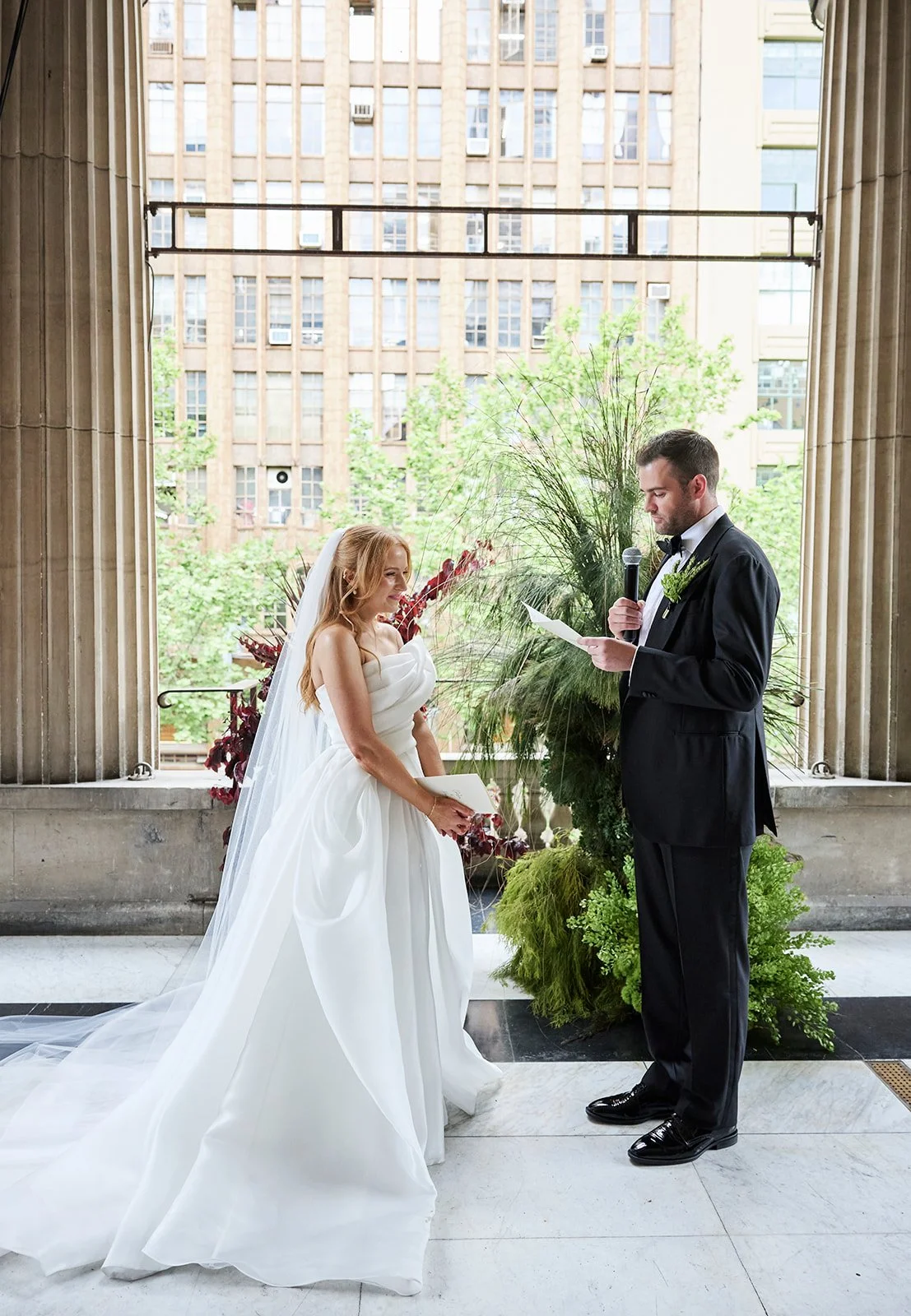 Chelsea and Henry officially become husband and wife at Melbourne Town Hall.