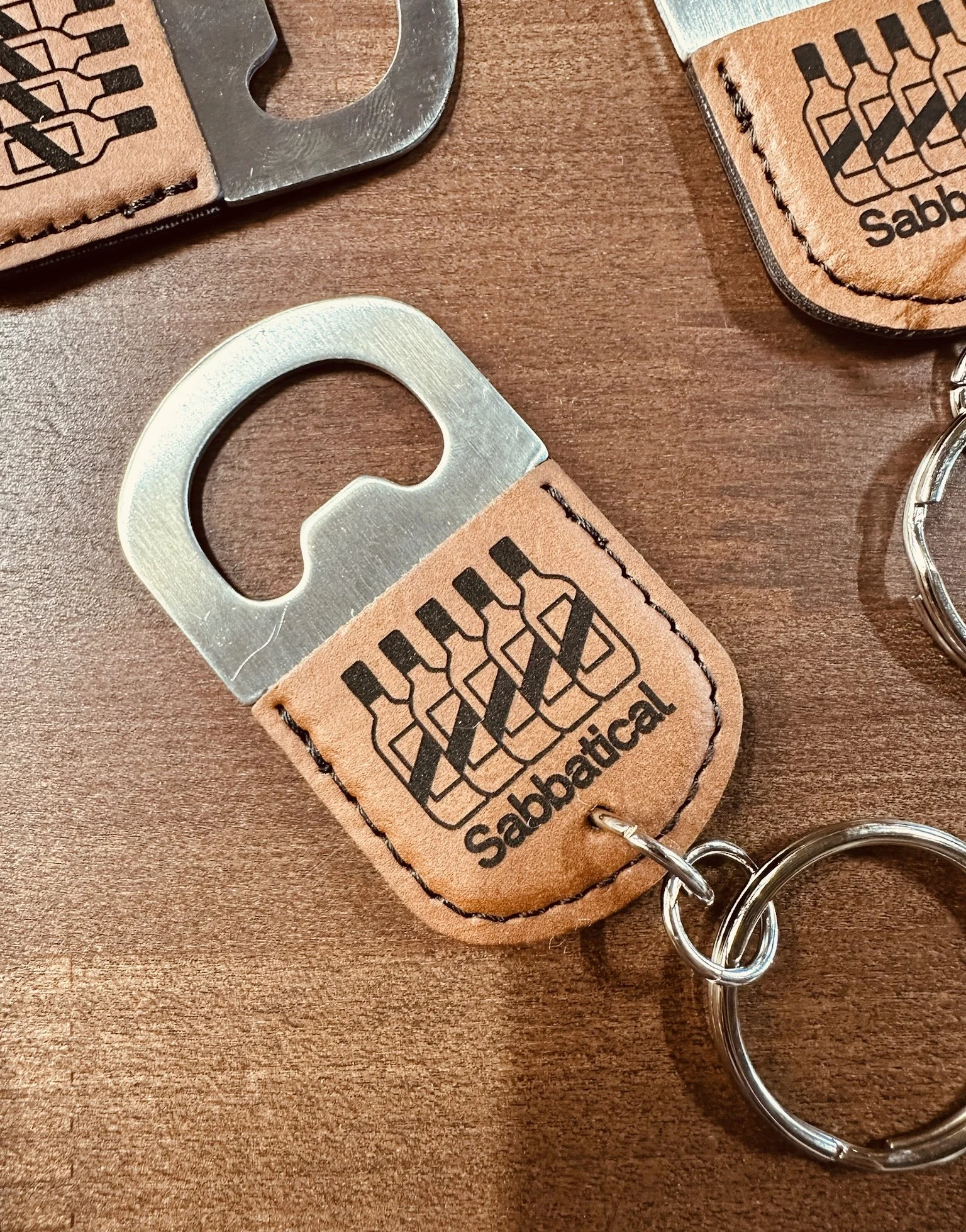 sabbatical bottle openers.JPG