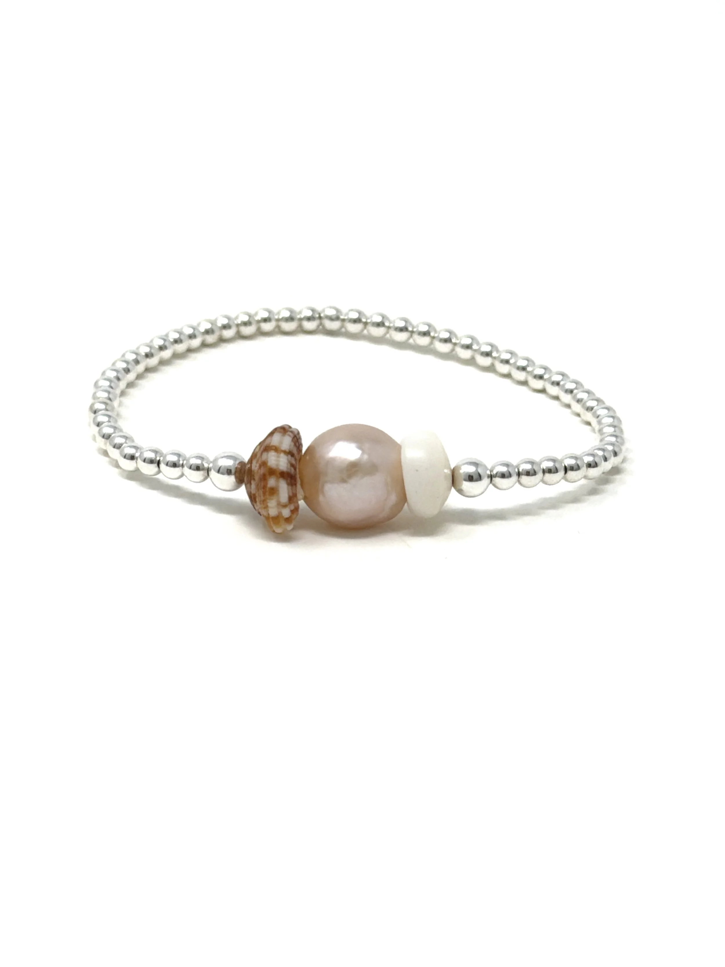Pink Edison pearl shell stretchy bracelet with 9mm pearl centerpiece and Hawaiian shells, accented with 14K gold fill or sterling silver beads. Handmade and stackable.