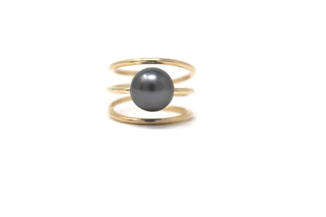 Handcrafted Floating Tahitian Pearl Infinity Ring - Elegant and Timeless Design - Shop NaniShells.com for High-Quality Pearl Rings - Perfect Gift for Special Occasions.