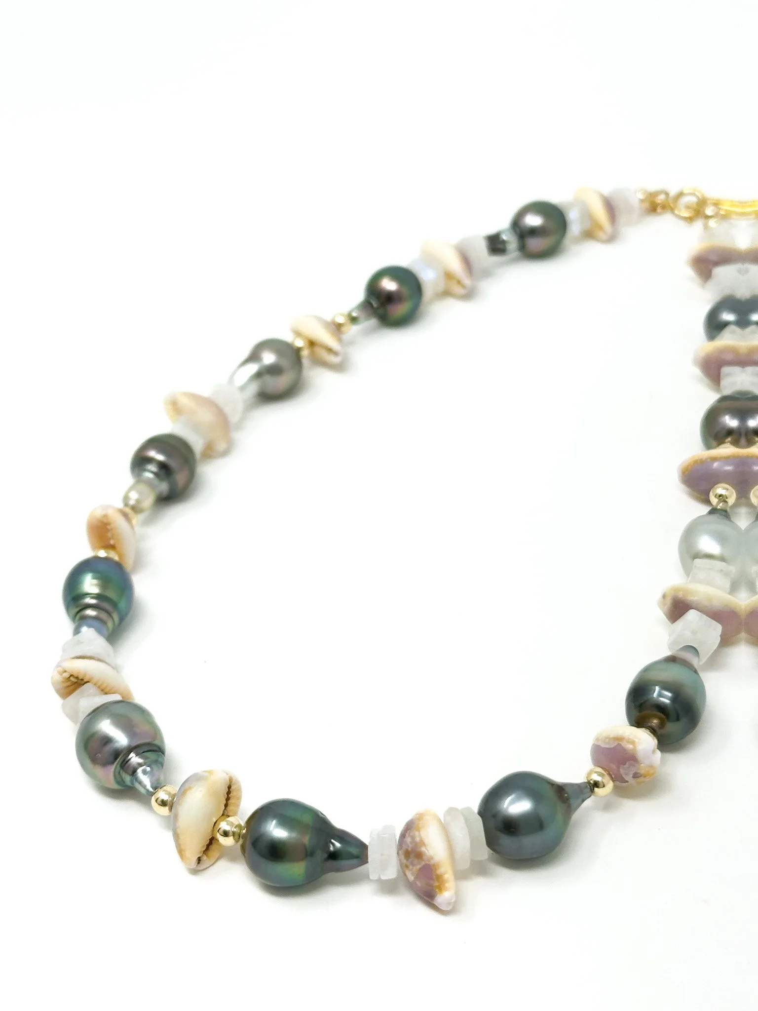 Cowrie Drop Tahitian Pearl Moonstone Necklace, varying pearl and shell shapes, adjustable length, handmade Maui artisan jewelry.
