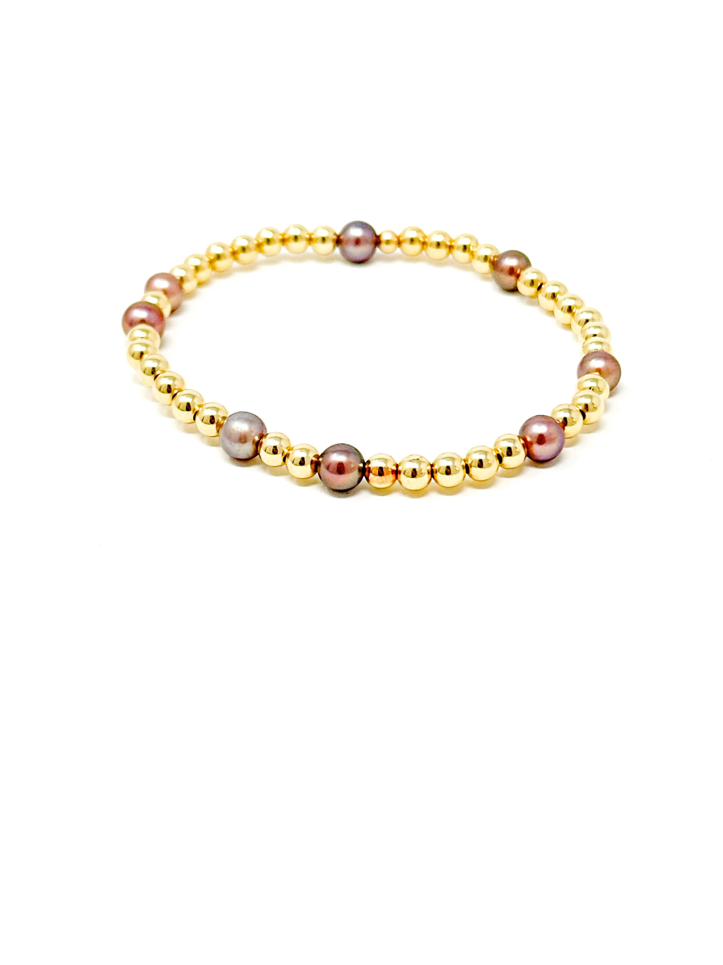 Handmade stretchy pearl bracelet featuring dark pink Edison Keshi pearls with gold fill or sterling silver accents. Ideal for stacking, layering, or gifting.