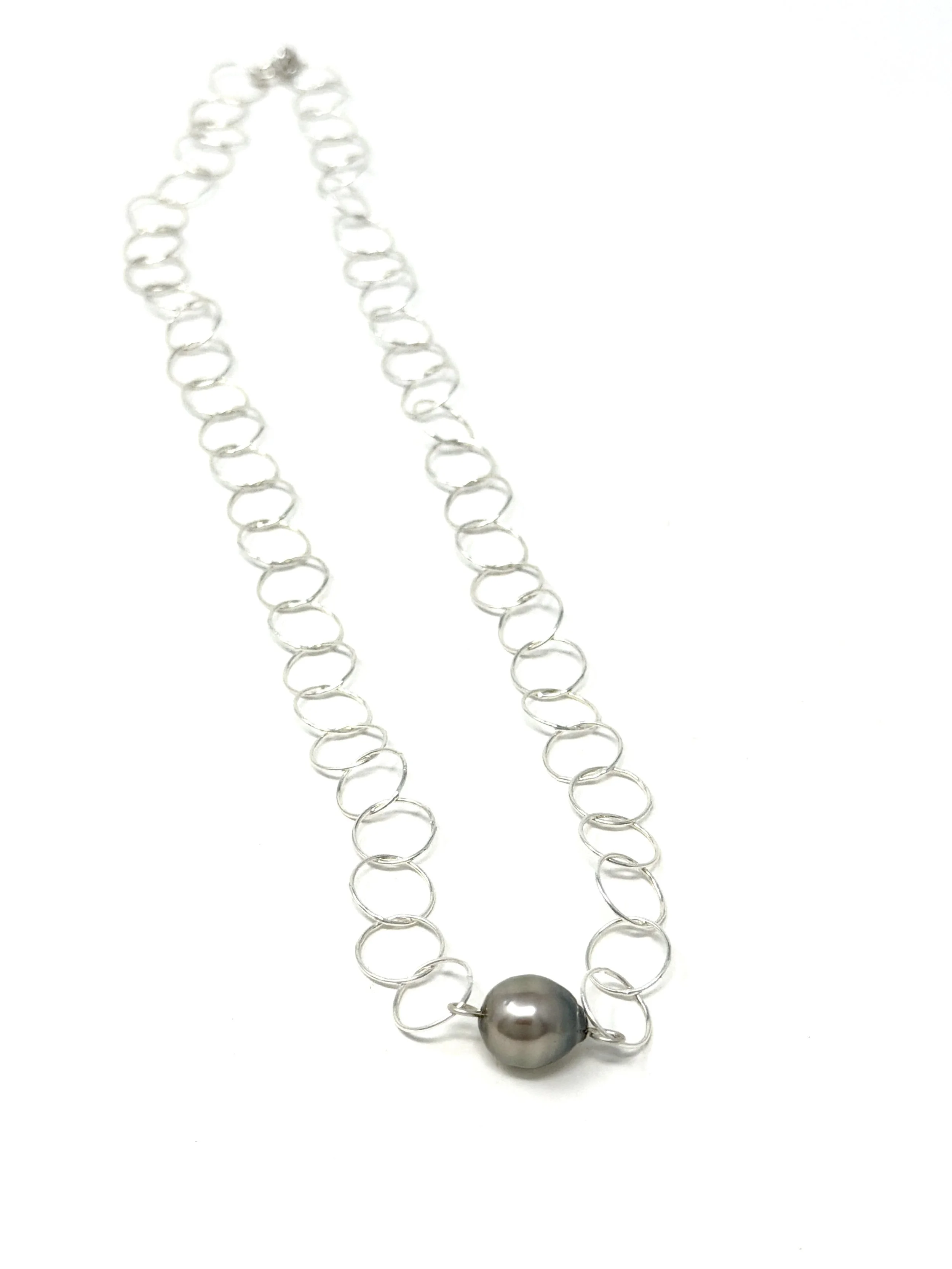 Endless Circles Pearl Necklace with a single Edison, Tahitian, or Keshi pearl at the center. Handmade, 14K gold fill or sterling silver, and is adjustable.