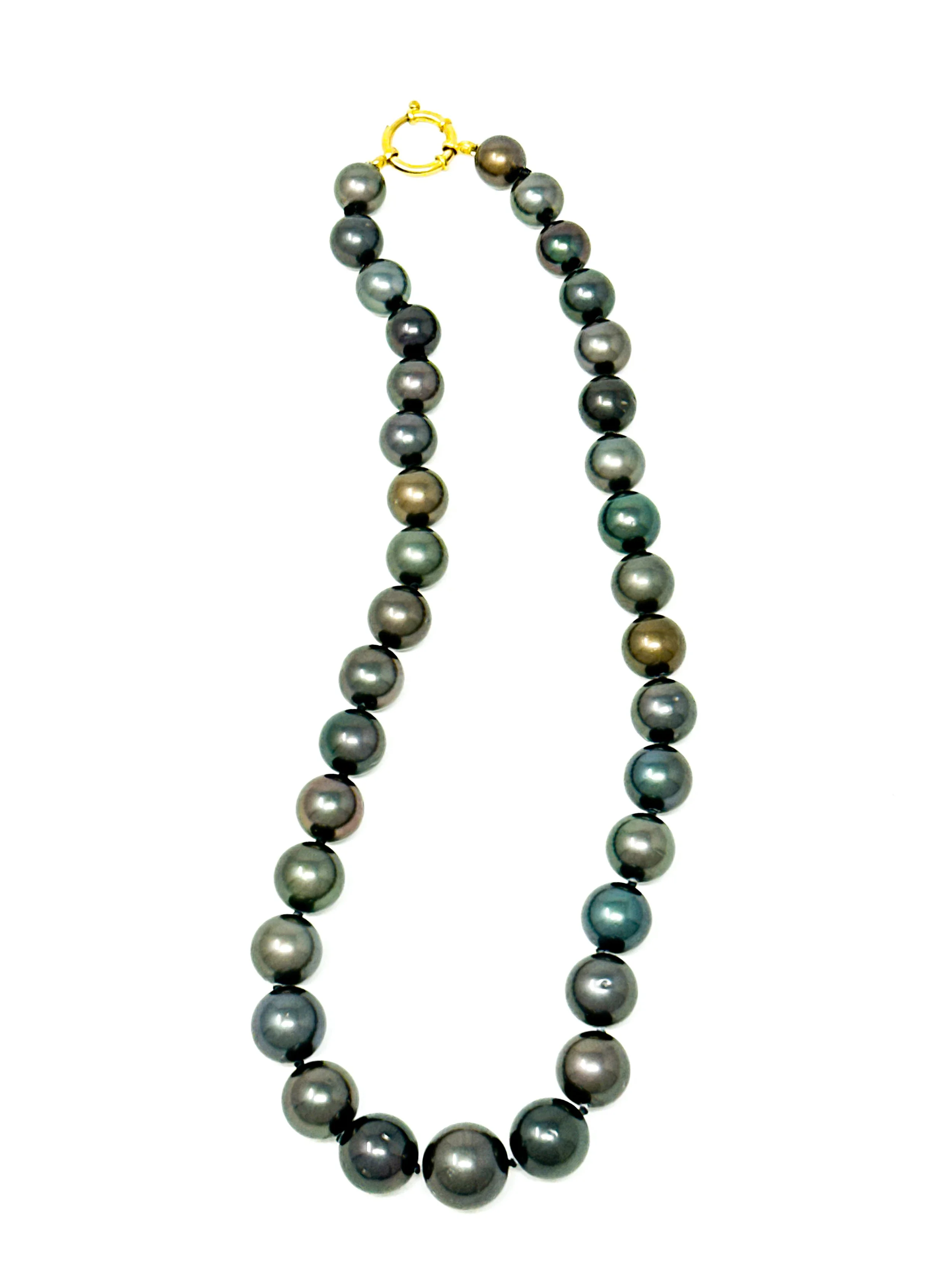 Tahitian near-round pearl strand necklace worn at 17.75 inch length for scale and fit