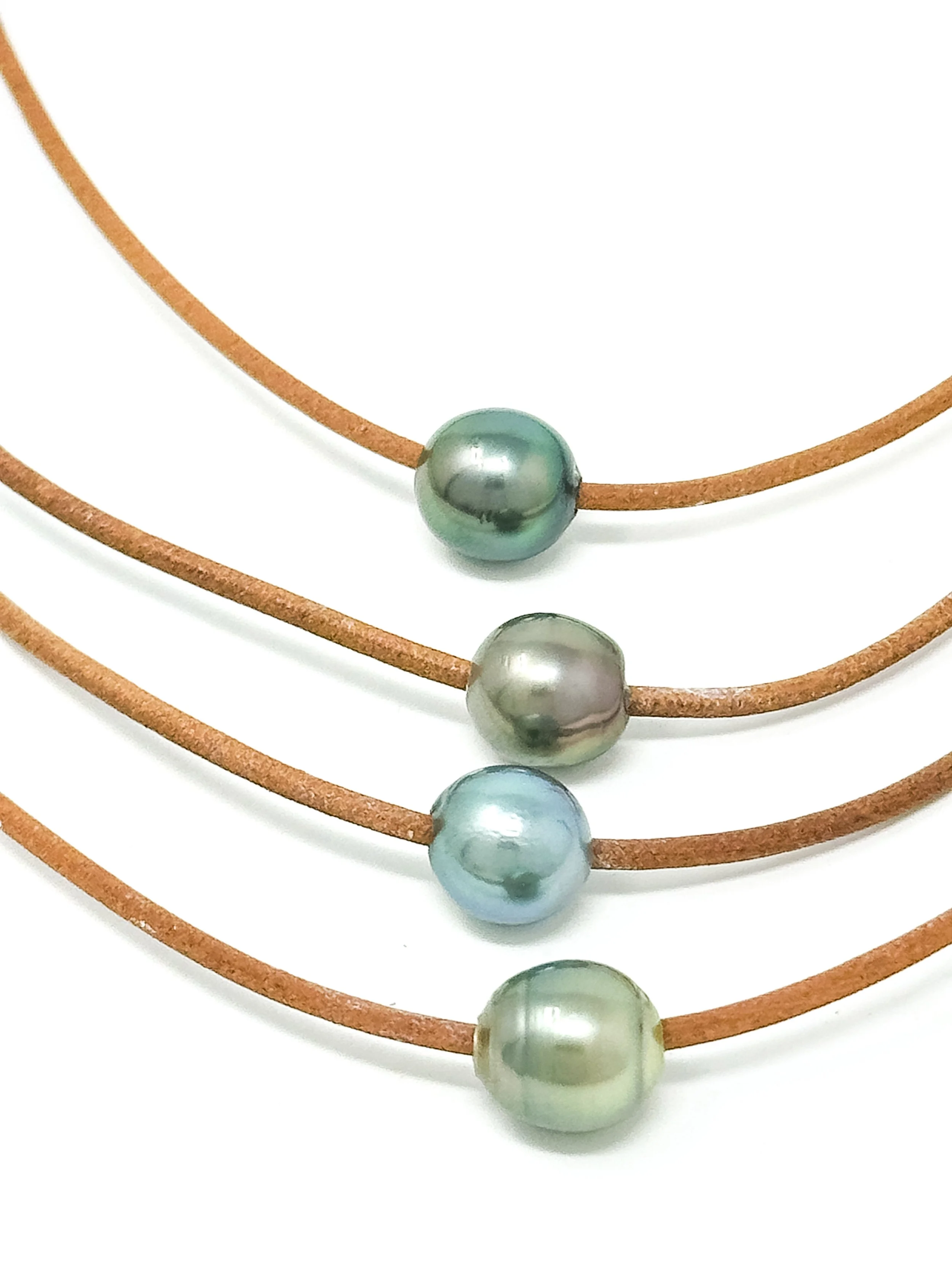 Minimalist handmade leather necklace with thin cord and colorful Tahitian pearl from Hawaii