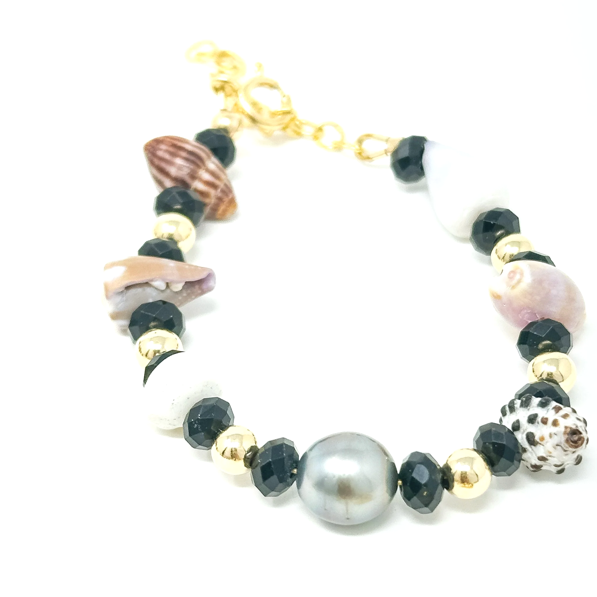 Maui handmade shell and pearl bracelet featuring thick black tourmaline gemstones