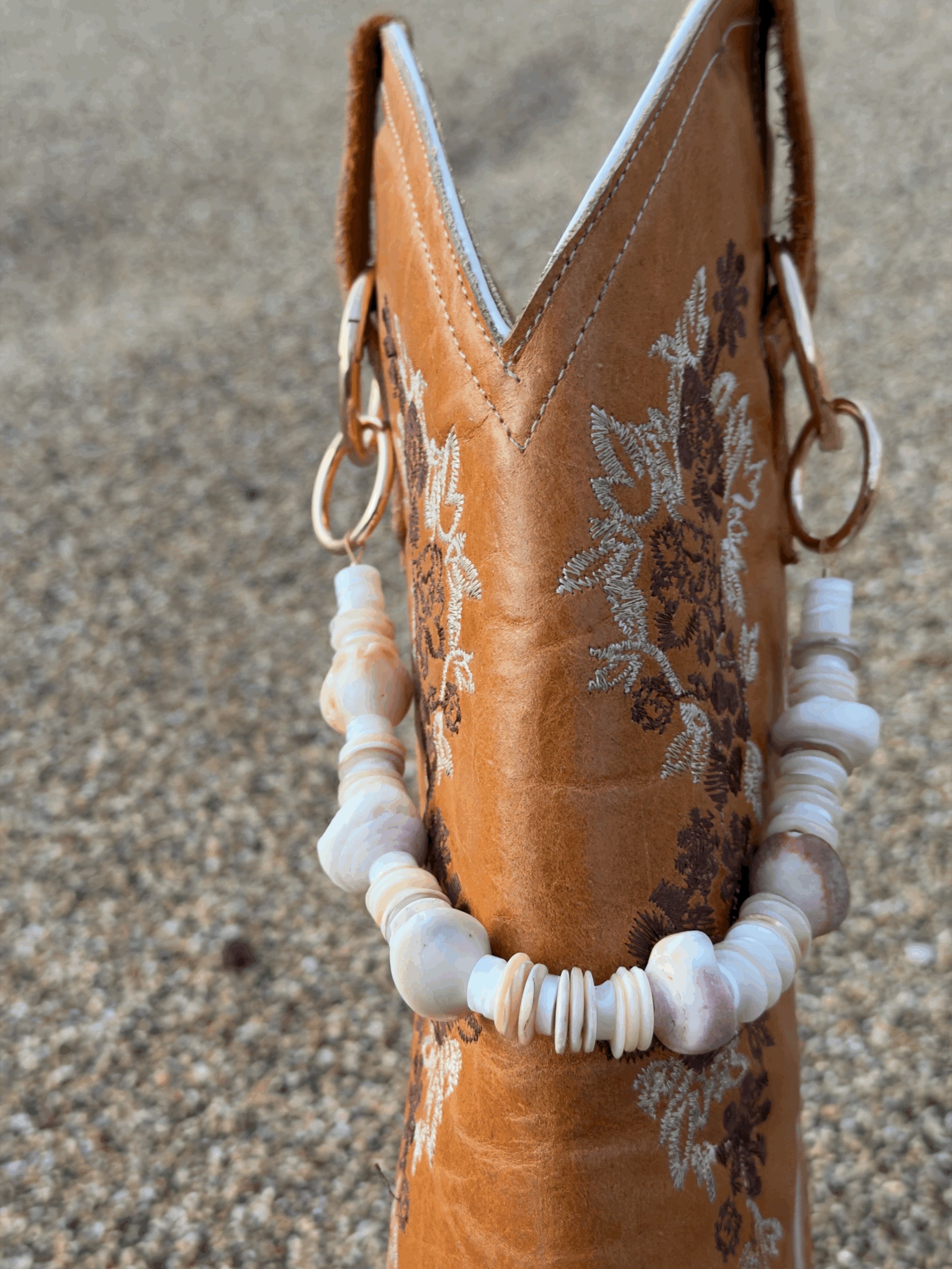 cowgirl-boot-chain-maui.gif