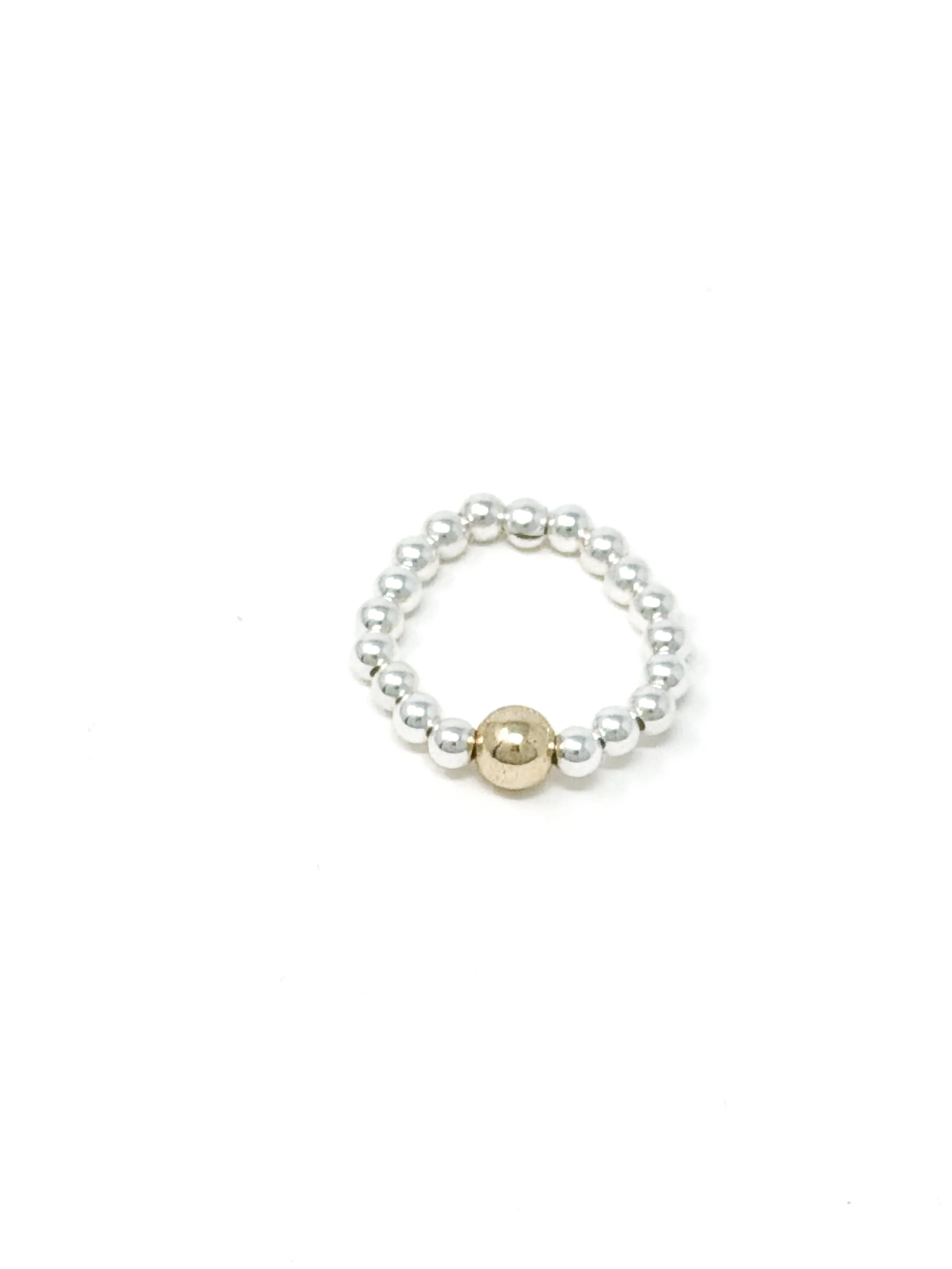 Gold and silver stackable ring with stretchy design. Lightweight, comfortable, and ideal for layering or gifting as modern minimalist jewelry.