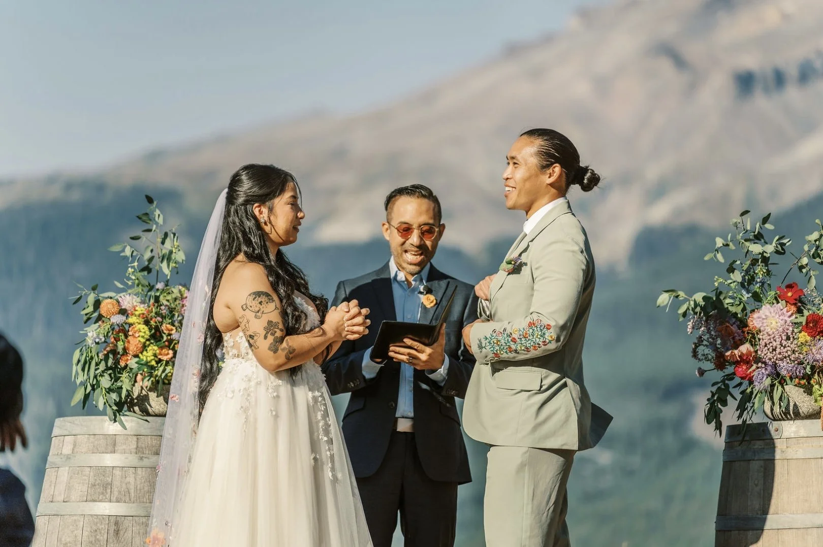 | Florals by The Petal Dispatch | Photography by Kris Ou Photo | www.krisouphoto.com | Pictured: Lush Centerpieces, Bud Vase Boutonnière |