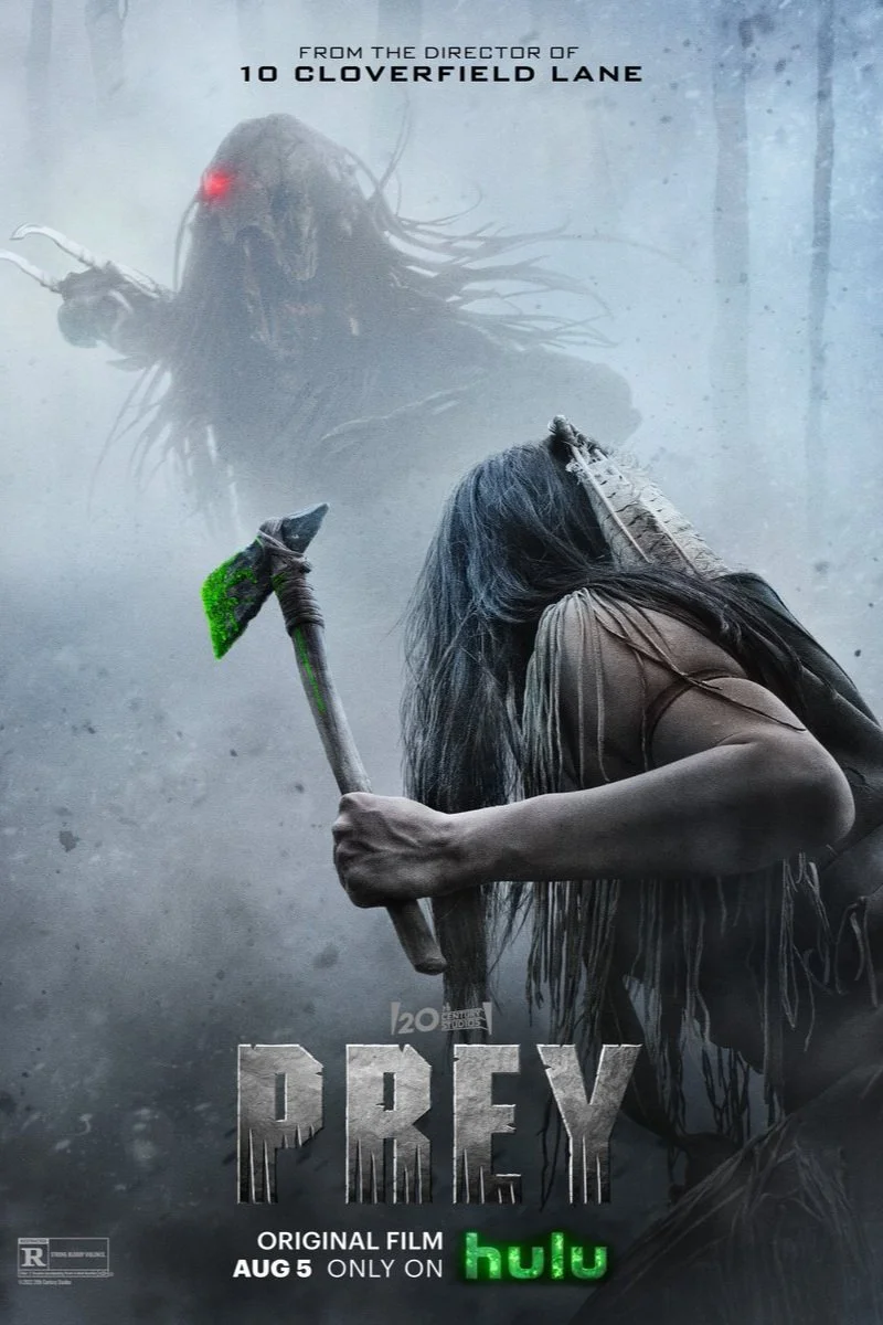 The poster for the horror film "Prey" shows a woman with long hair crouching and holding an axe with a glowing green blade. Behind her, a large creature with dreadlock-like hair and glowing red eyes looms in a misty, forested background. The text indicates the film is available August 5 on Hulu.