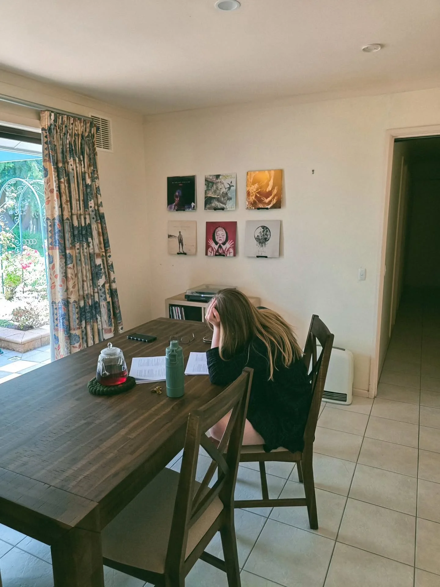 Tyler took this picture of me back in the summer (January, just after New Year's) while copy editing Theodora's Tea Shop. 

Now, it's June, and the final proofs of the novel were submitted one month ago. I can't quite believe it. I'm still waiting fo