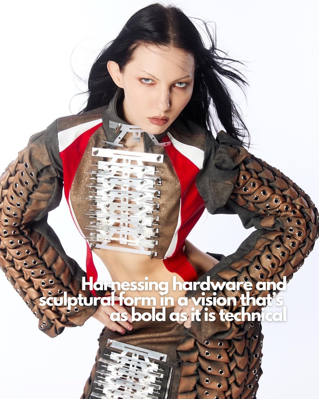 Metallic lacing and sculpted sleeves armour this futuristic silhouette. 
@celinajsh @labyrina.th a graduate of Bangkok&rsquo;s College of Creative Industry @fash_swu @fash24swu @fash27swu merges experimental textiles and industrial design in a defian