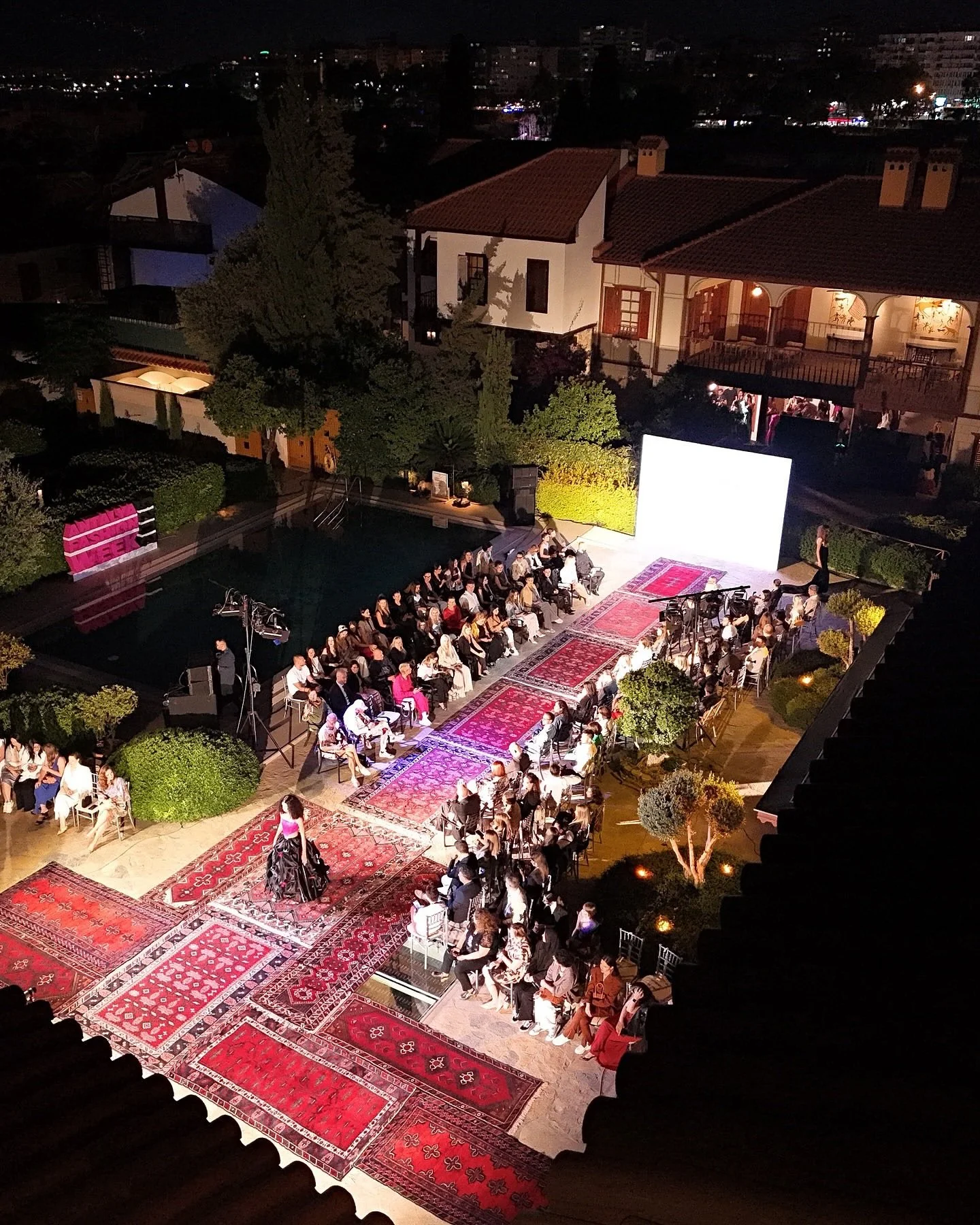 Heritage Woven into High Fashion
Antalya Fashion Week x Fashion Scout partnership saw John Herrera unveil a moment of sartorial brilliance at Ruin Adalia, framed by the atmospheric charm of Kalei&ccedil;i and its centuries-old Anatolian carpets.

The