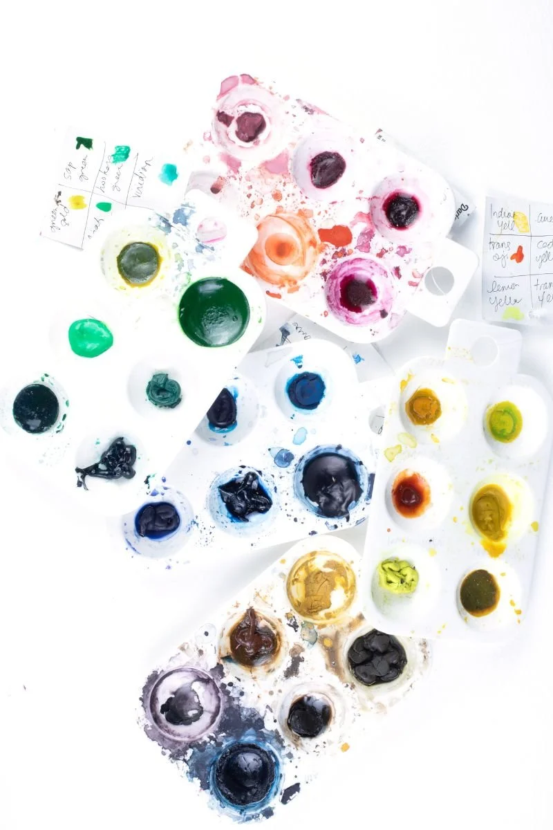 Freshly made natural watercolour pigments in pans at Zurich Art Club's pigment workshop