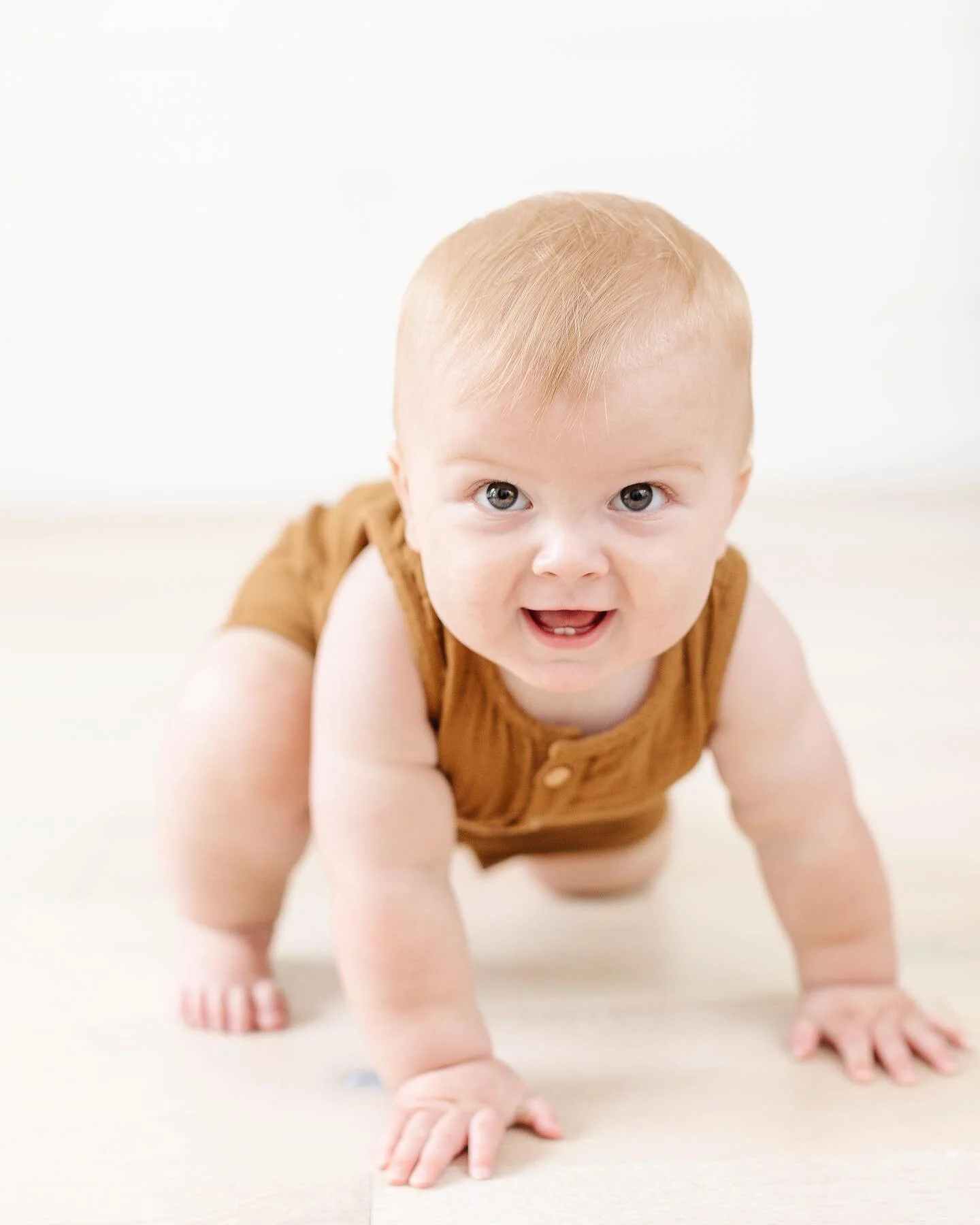 9 month olds are so precious- everyday is a new adventure; exploring- discovering- trying new things. 
.
This sweet guy got on his knee and semi crawled during our session.  Normally, as a master army crawler, we were excited and surprised. 
.
If you