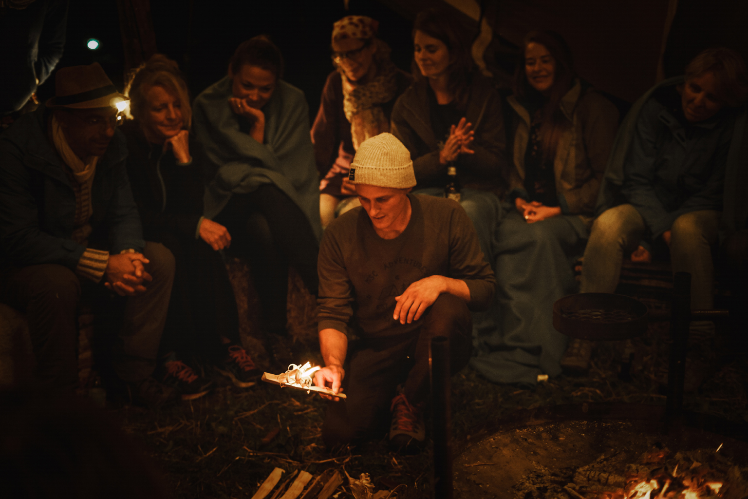  Andrew teaching some fire making techniques on the first night. 