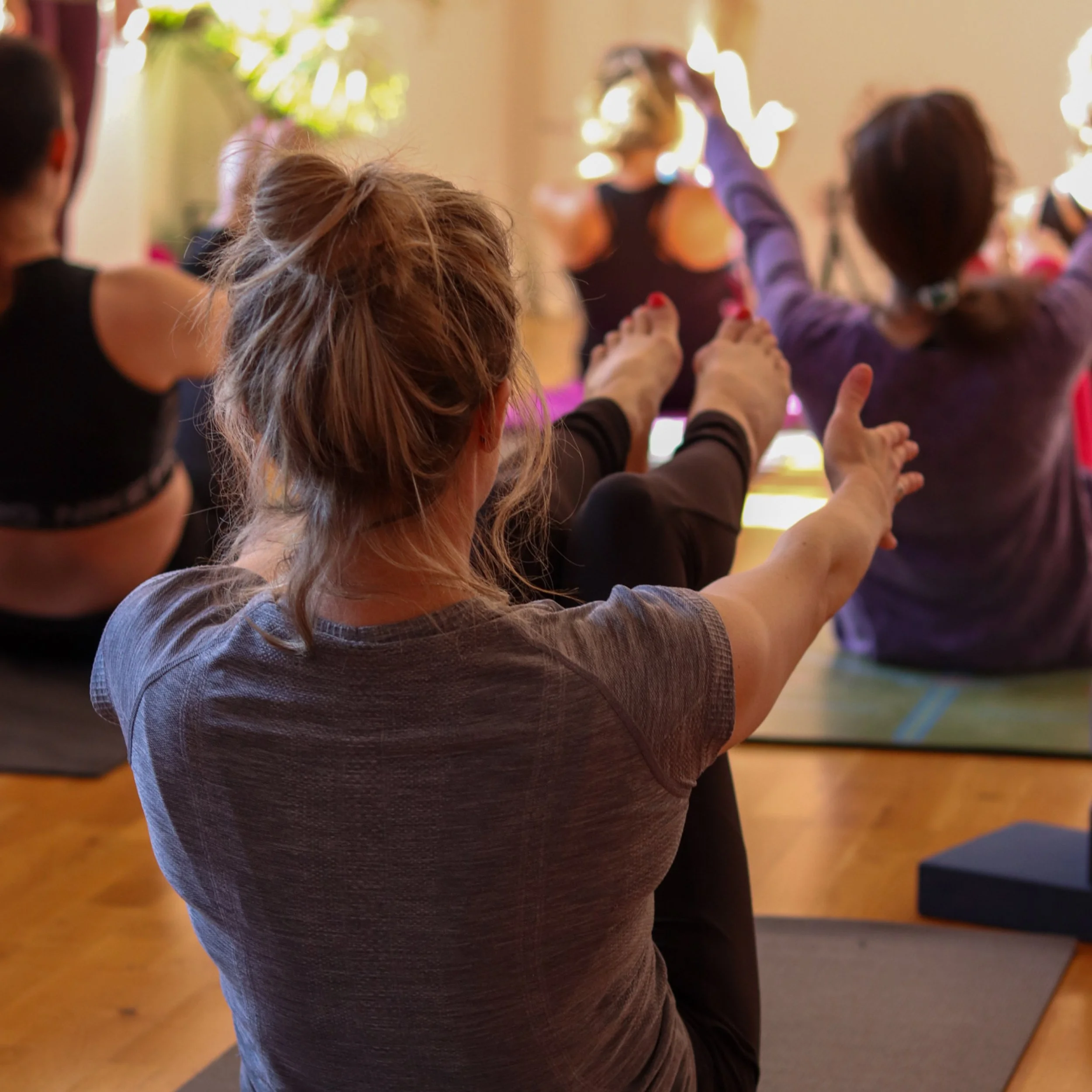 Beginner yoga class in Glasgow at Merchant City Yoga in a supportive studio environment