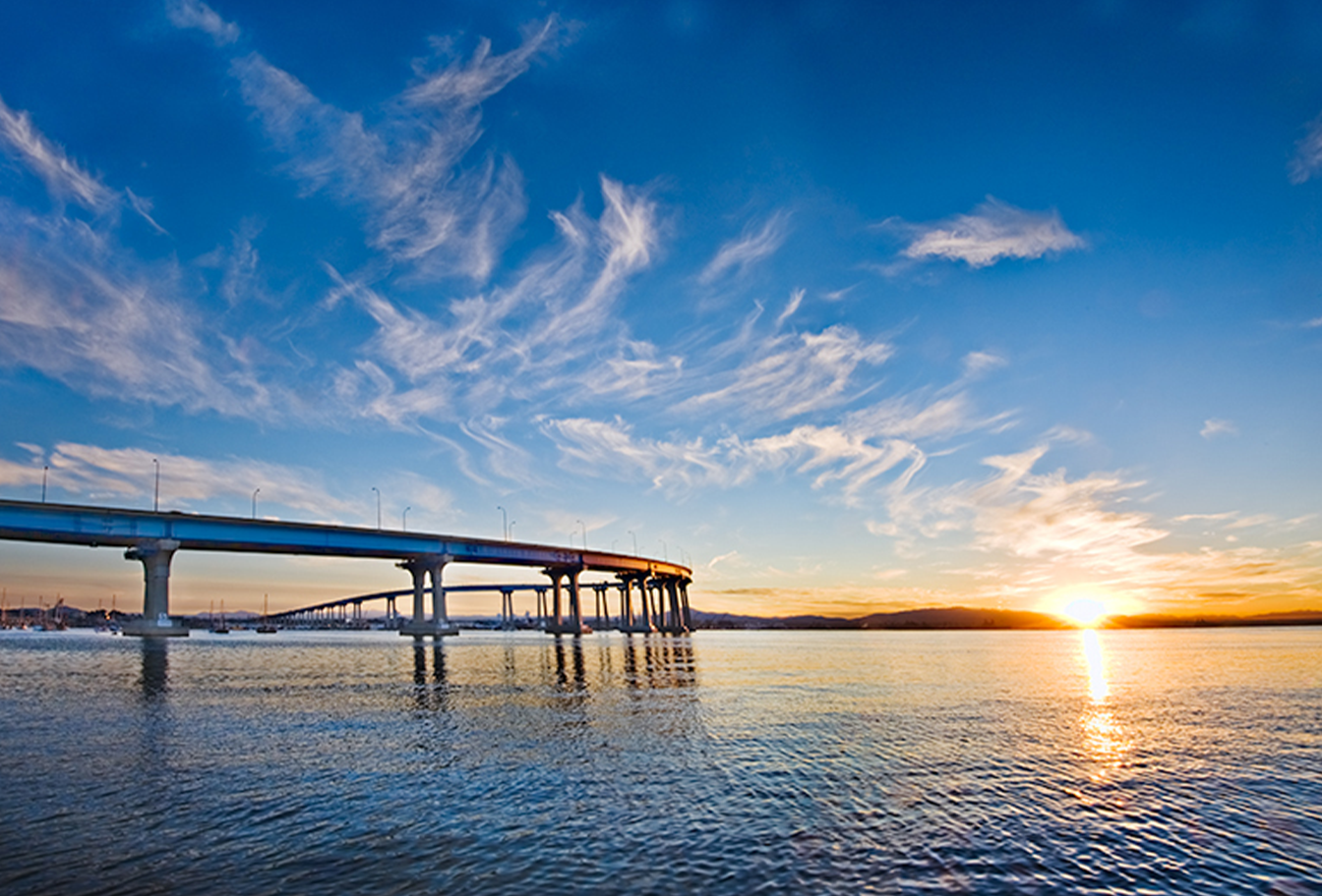 Wellness - Bridge over water at sunset.png