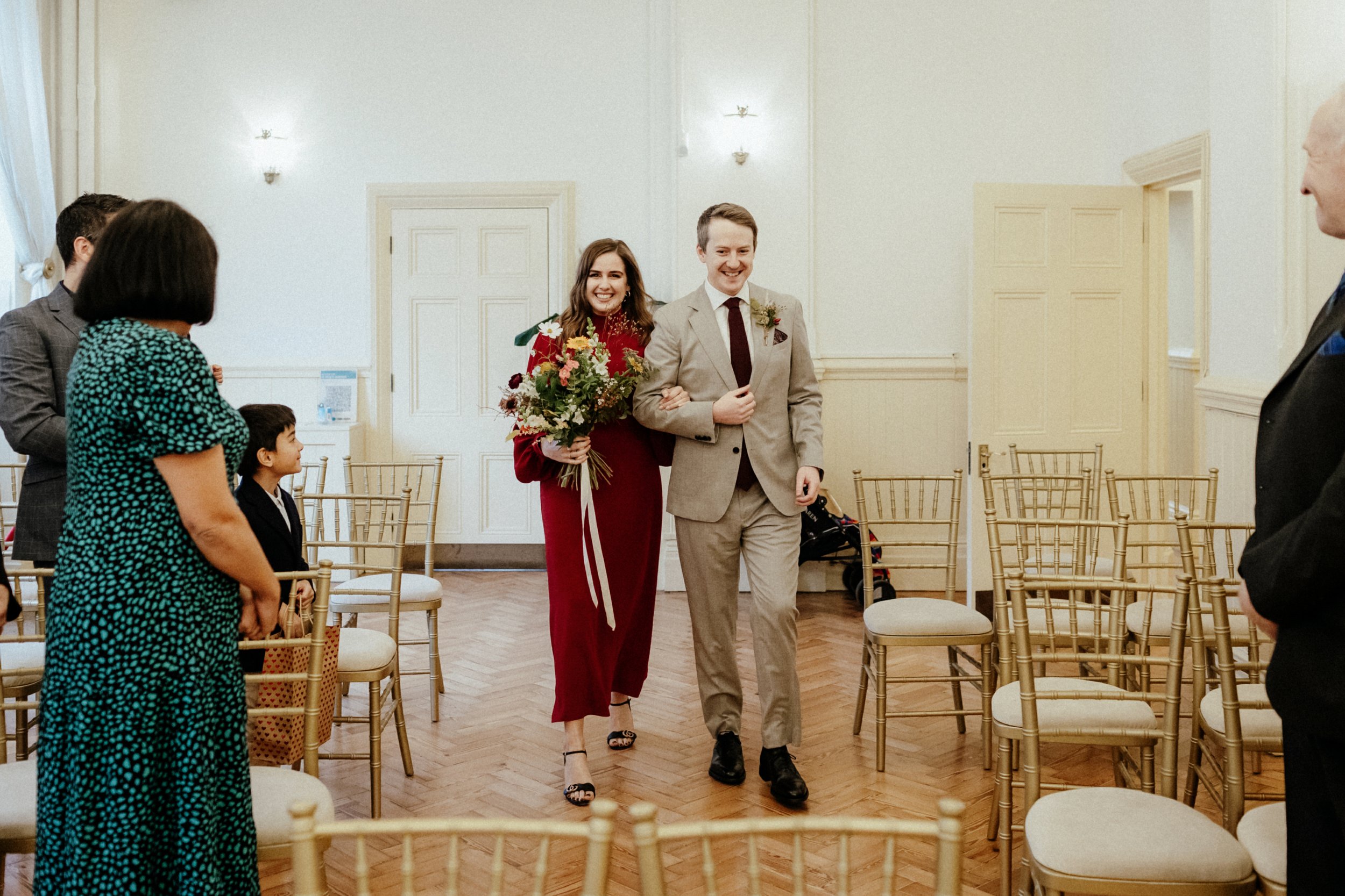 Couple entering their wedding ceremony in The Regency Room