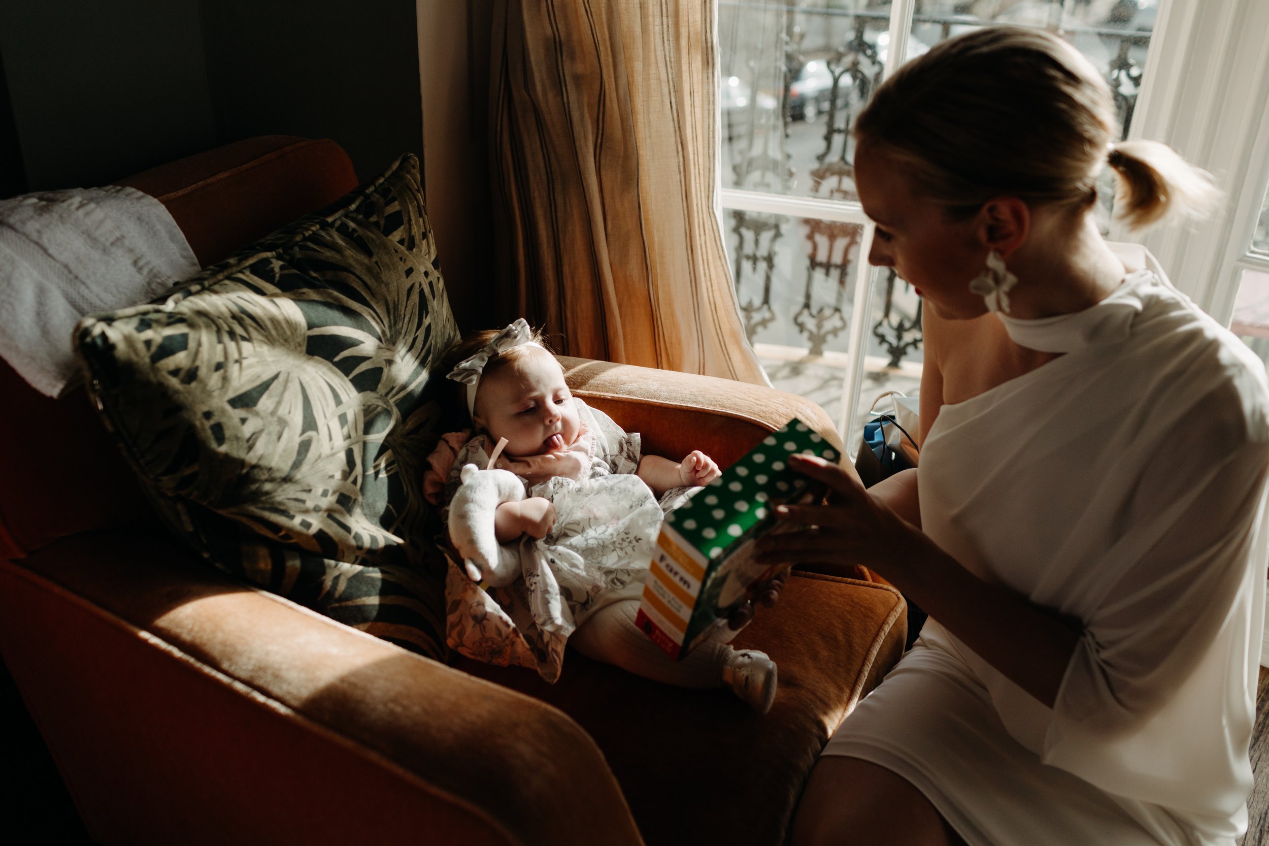 Bride and baby on wedding morning