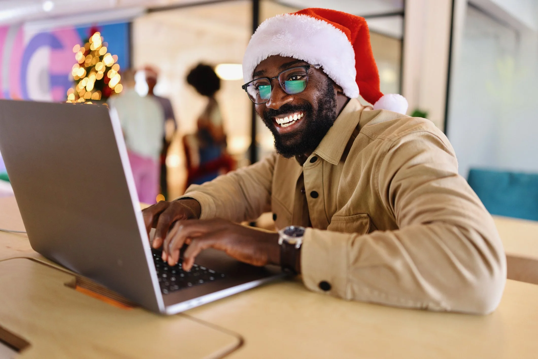 Man playing virtual christmas game with his team