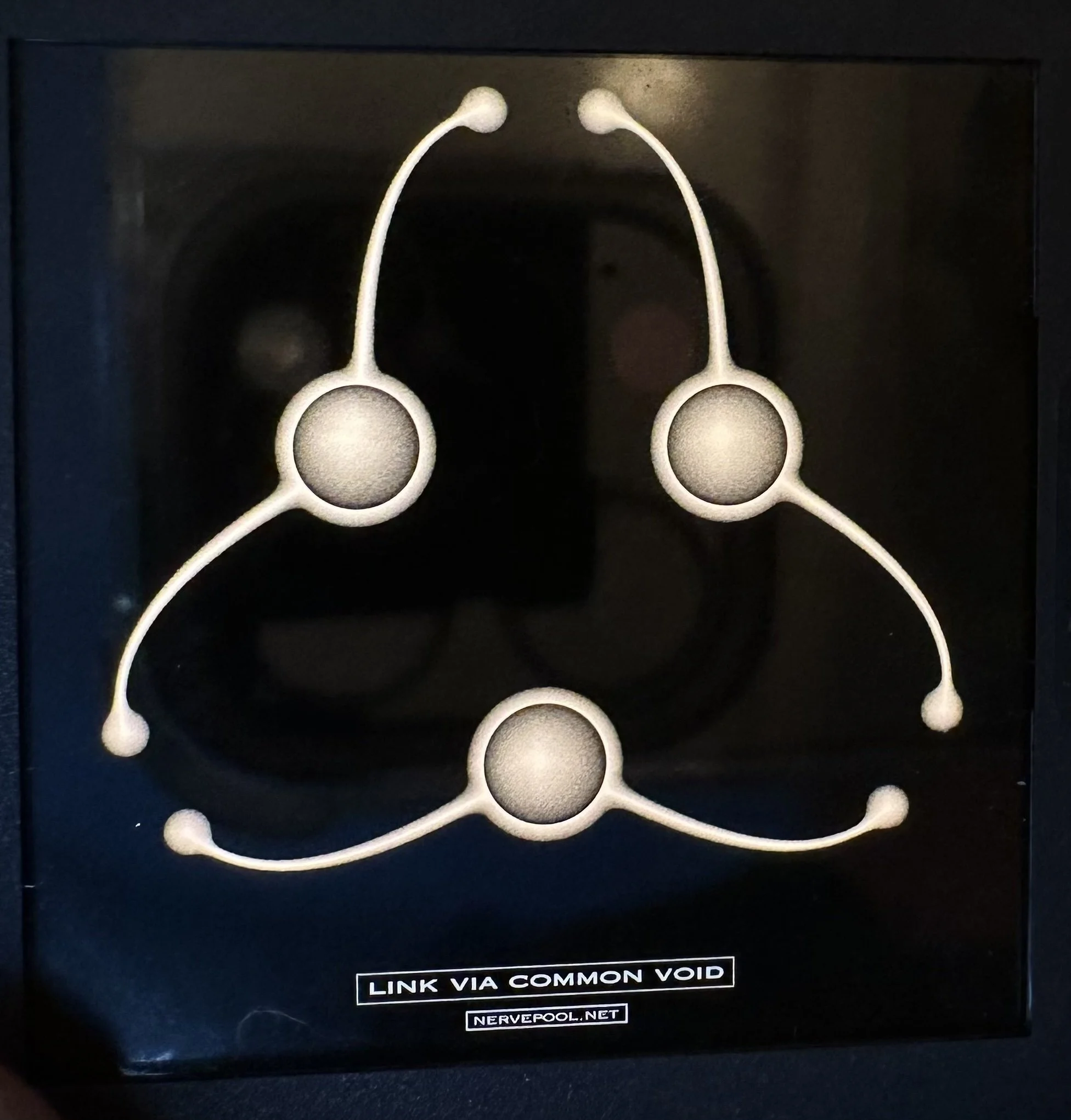 Ebon Fisher, "Zoacode: Link Via Common Void." One Zoacode slide + projector offered as a weekend rental.  Auction price no longer available