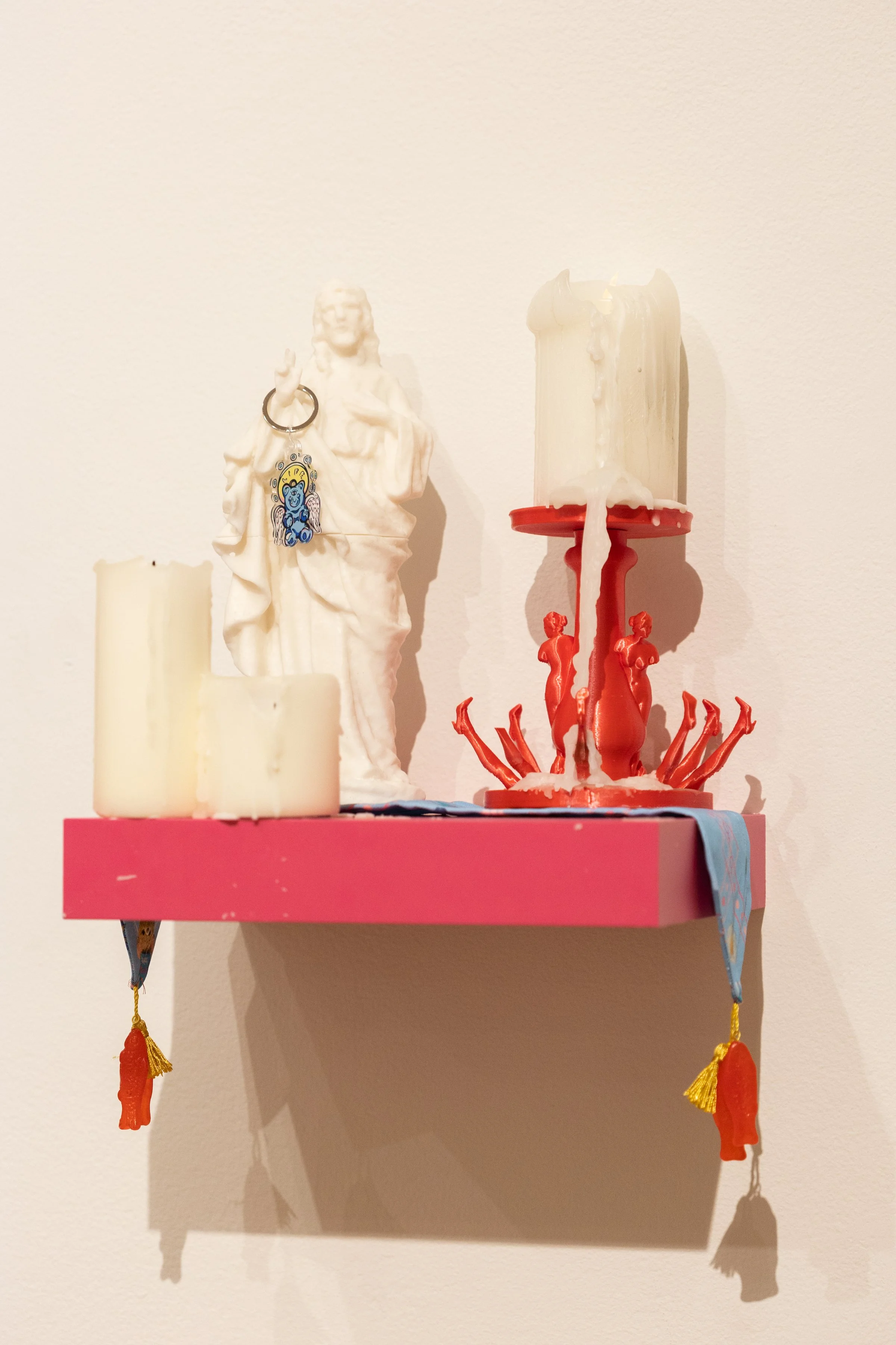 Detail of installation with fabric work and 3D printed candle holders