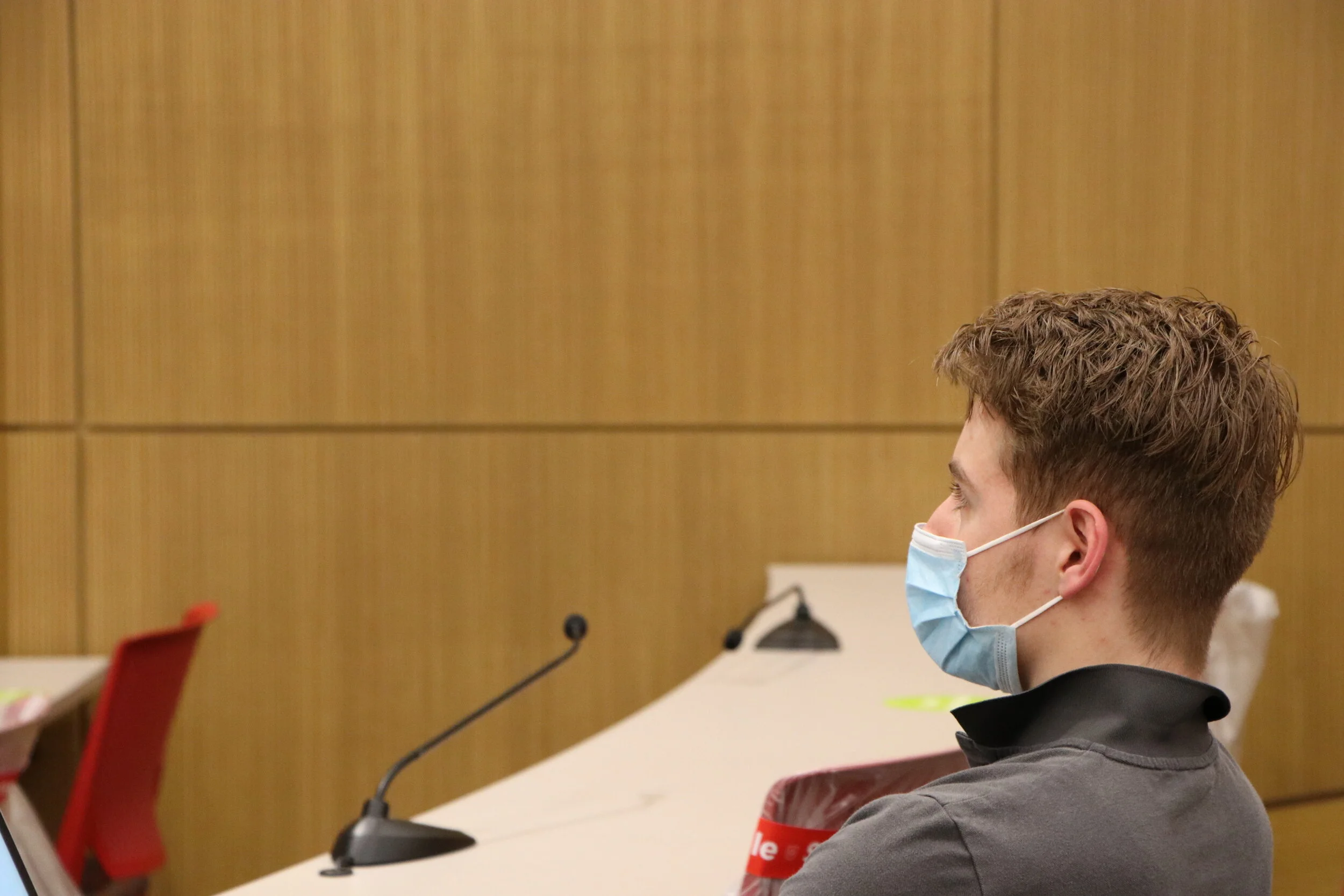 Senior Portfolio Manager Ryan Nyffeler listening to Michael Bydalek's presentation.