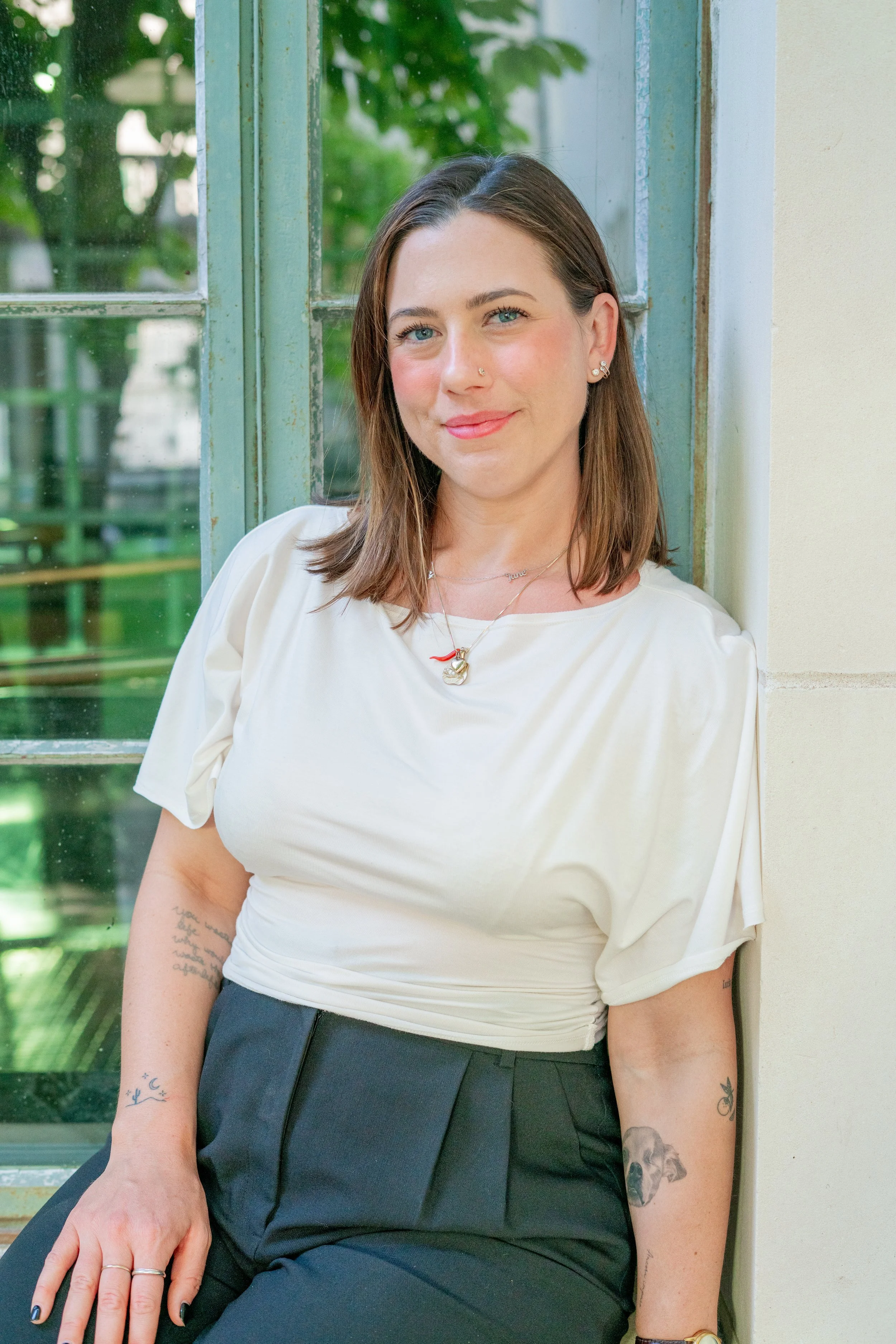 Portrait of Rebecca Ramming, therapist and owner of Holistic Healing Psychotherapy who specializes in grief and loss, life transitions, anxiety, and depression.