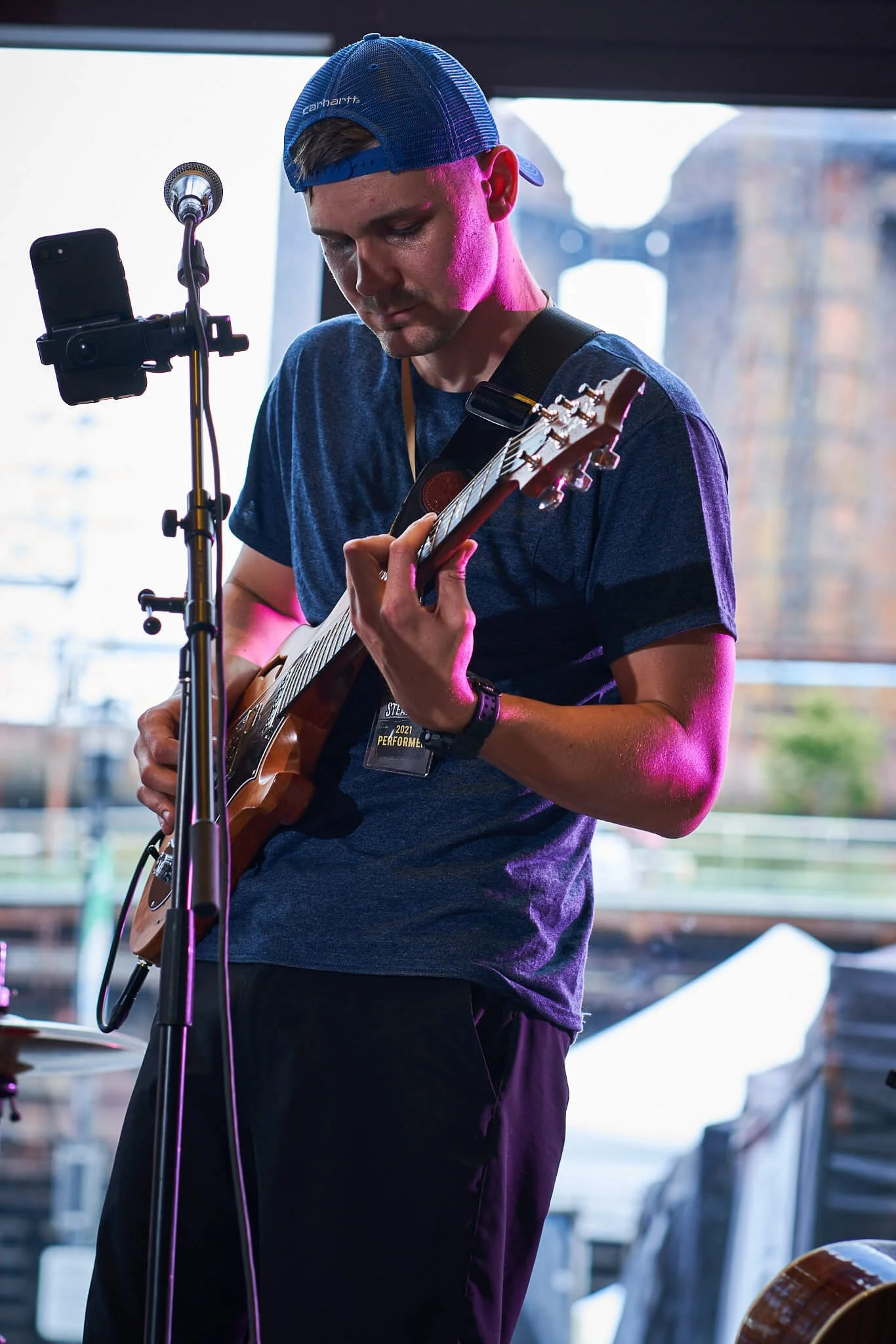 Lehigh Valley PA Event Photographer - Bethlehem Steam Fest Convention the geek grid studios michael wesley scott looking at guitar.jpg